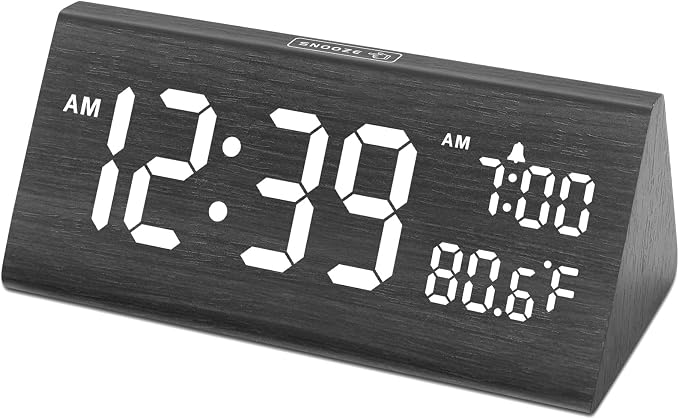 DreamSky wooden digital alarm clock on Quinton Heck's desk