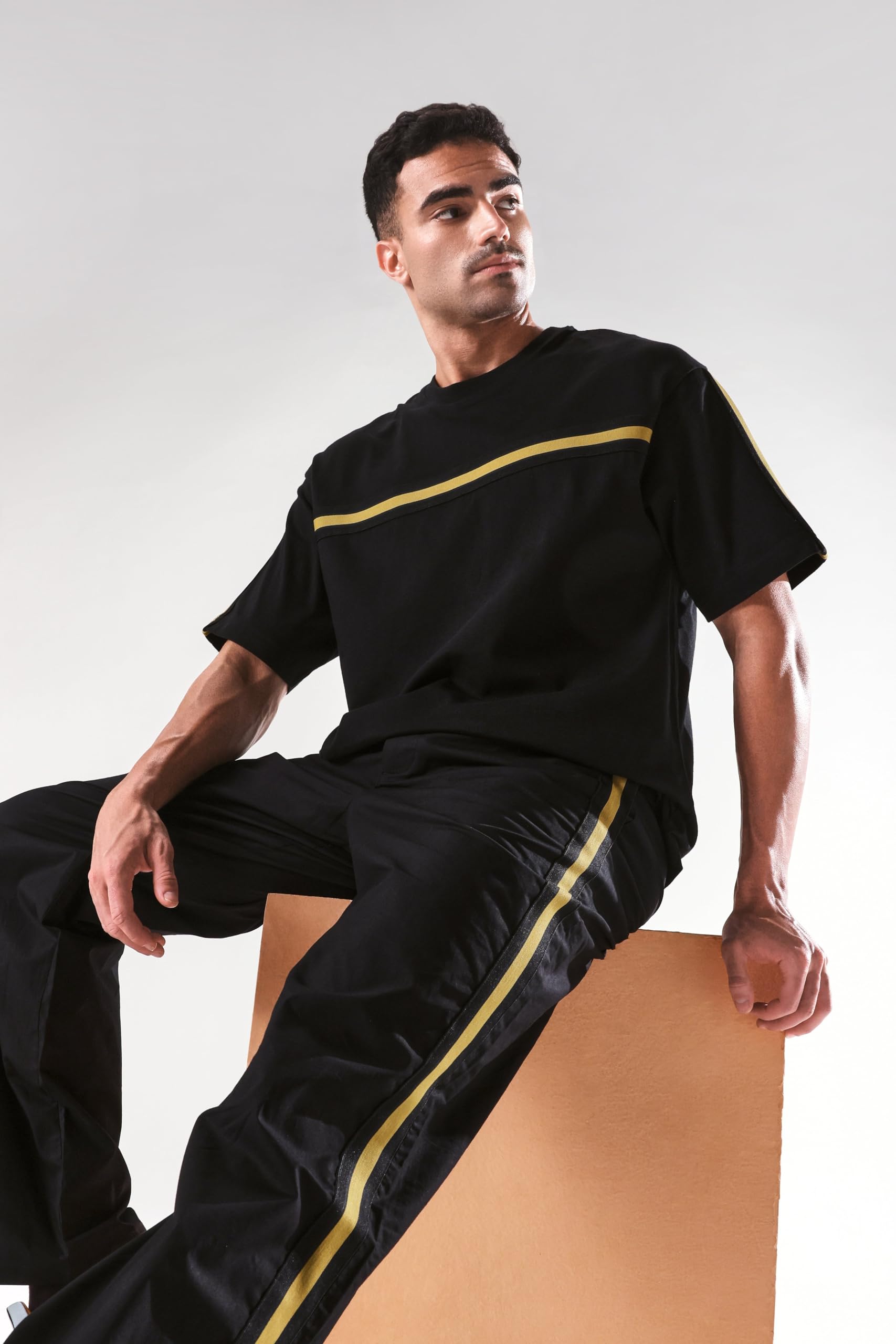 RARE RABBIT Men's Newnon Black Cotton Plain Baggy Fit Track Pant 1