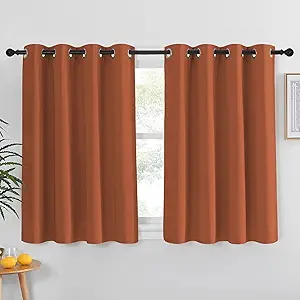 NICETOWN Blackout Burnt Orange Curtain for Girls Room - Solid Grommet Sound & Light Reducing Room Darkening Window Treatment Thermal Drape for Cafe/Kids Room (1 Panel, W52 x L45)