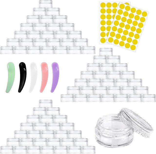 AMANMAN 100 Pcs Sample Pots Travel Cosmetic Jar 5ml/5g Small Plastic Containers Empty Clear Tin Bottles with Lids Labels Spatula Makeup Accessories for Toiletries Lip Balm Cream Liquid Glitter Storage