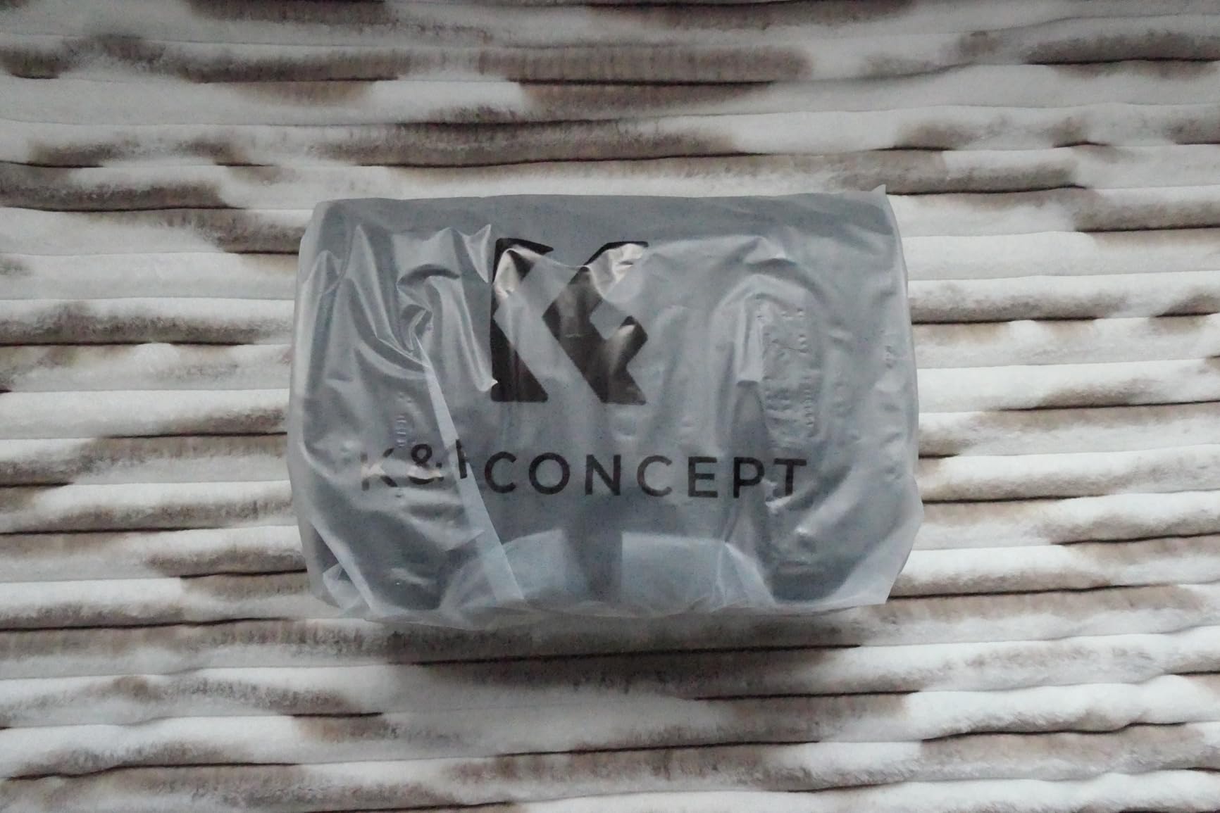 Decent mid-sized photographer's sling bag, good size to capacity ratio, quality materials