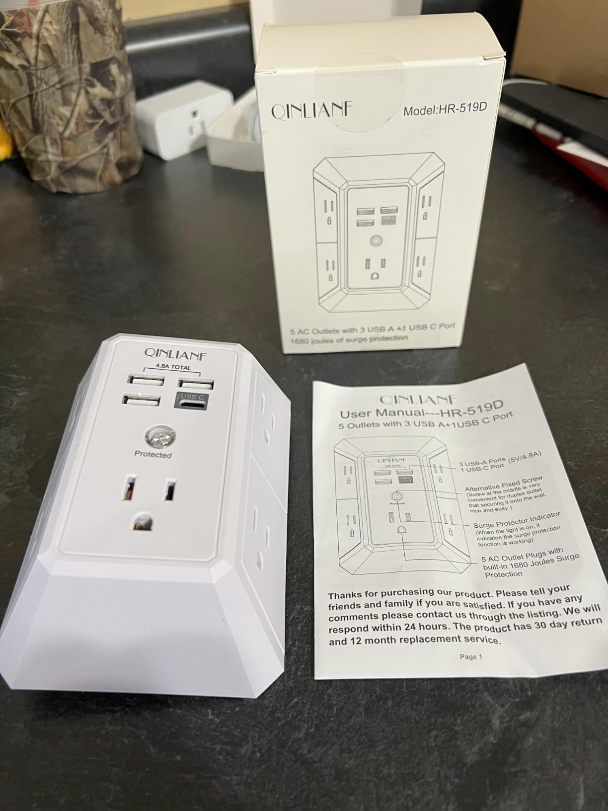 QINLIANF outlet extender taken out of packaging with user guide