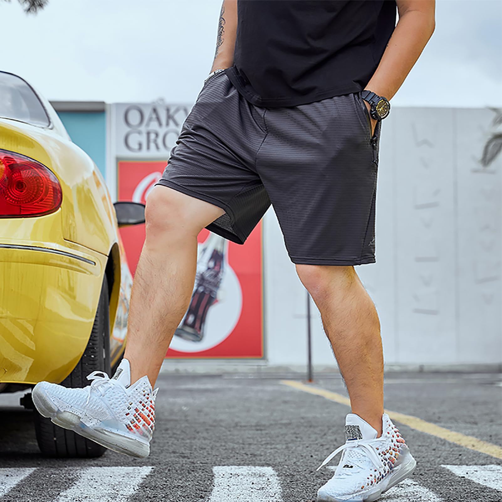 Homme Grande Taille Short de Sport en Maille Extensible Séchage Rapide Short de Course avec Poches Zippées (S-6XL)