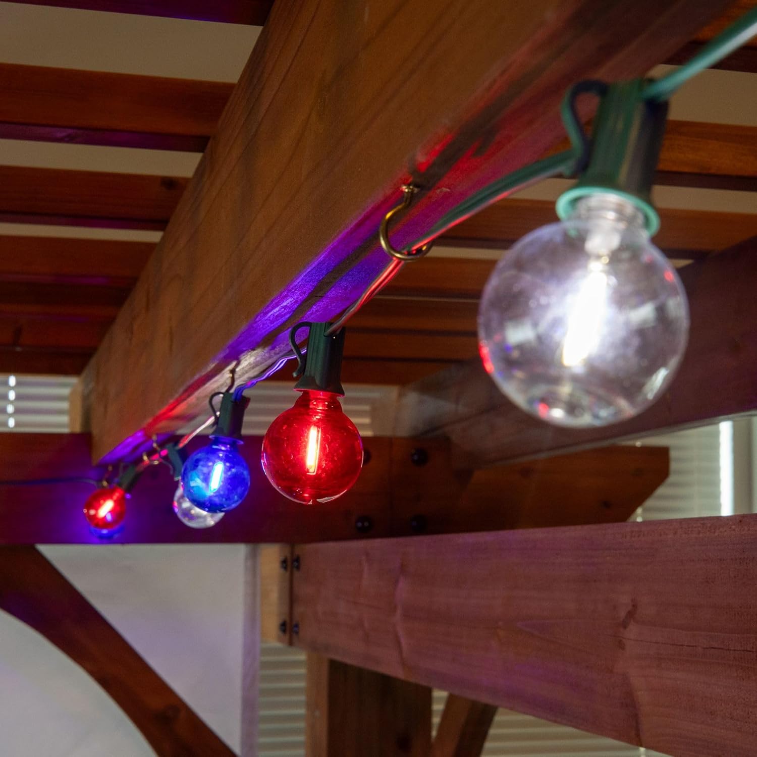 Novelty Lights G40 Filament LED String Light, Translucent Red/White/Blue Bulbs, 25 Globe Lights with 12" Spacing on Green Wire, Indoor/Outdoor Festive Patio Lights