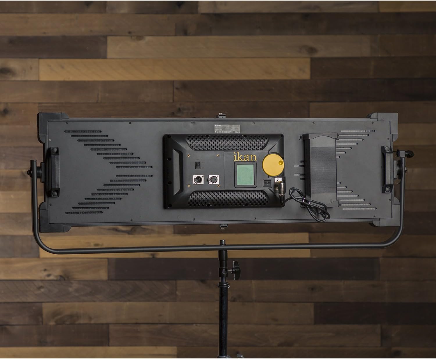 Arxa view of the Ikan Lyra LBx30 LED light showing power input, DMX ports, and control panel