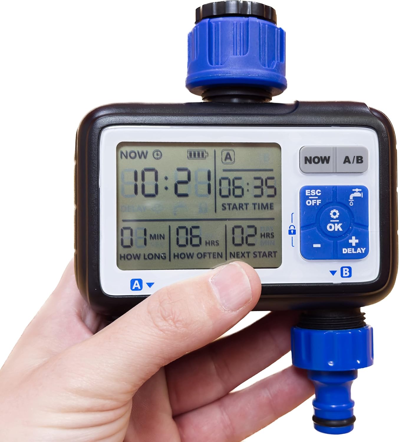 Hand holding Aqua Control FullVision 2 timer, showing display details