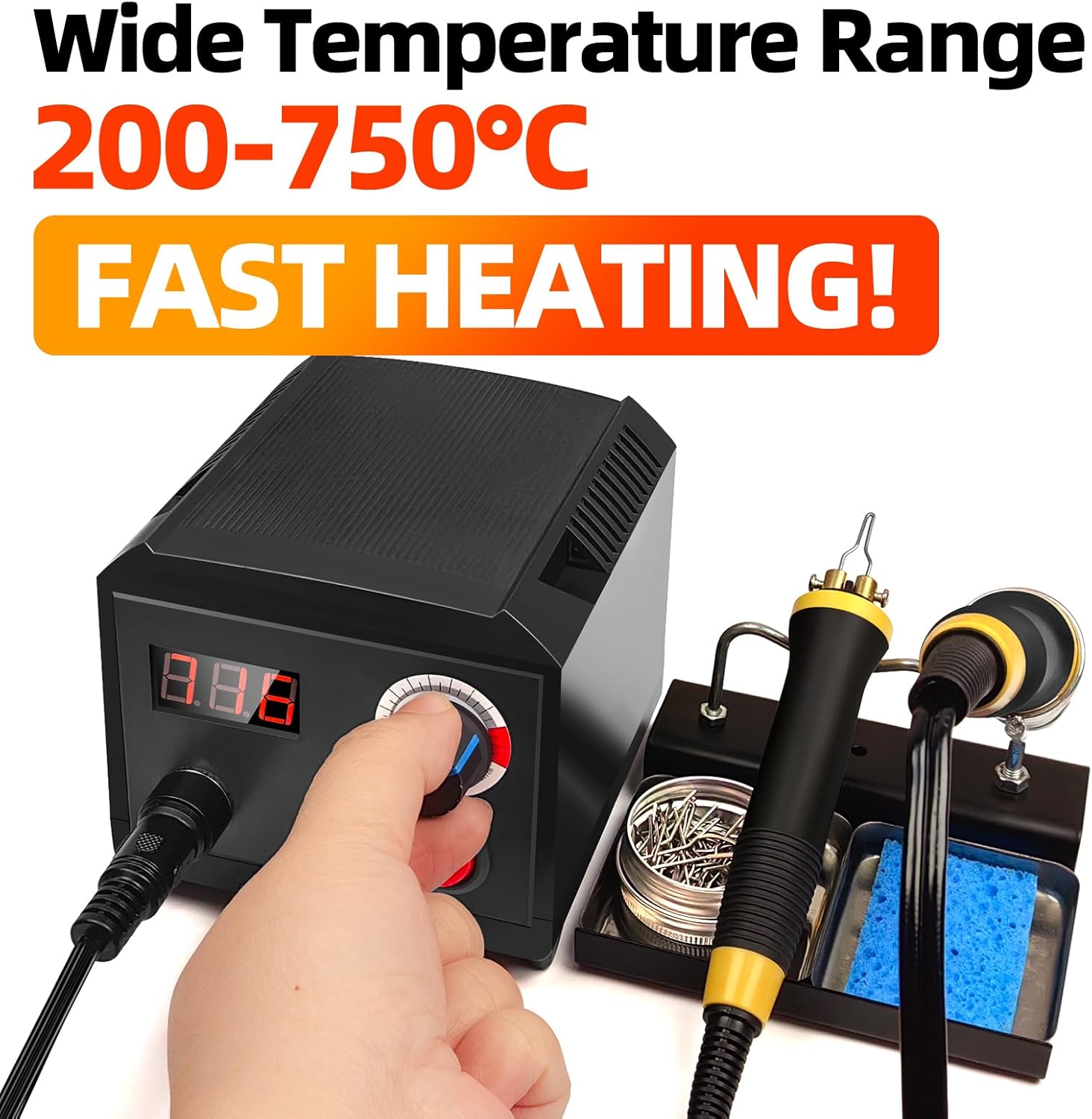 Hand adjusting the temperature knob on the wood burning tool, showing digital display and fast heating