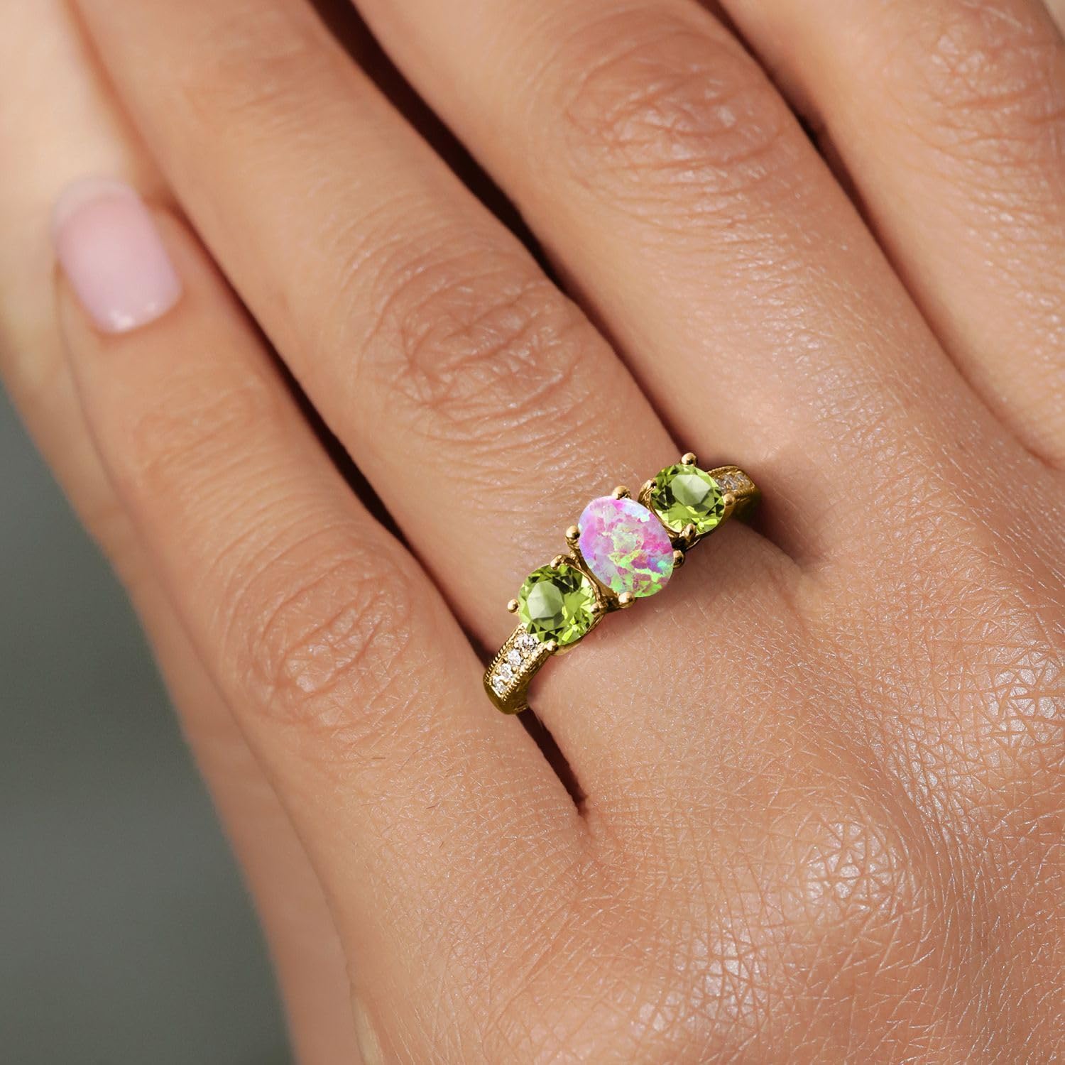 Gem Stone King 1.85 Ct Oval Cabochon Pink Simulated Opal Green Peridot 18K Yellow Gold Plated Silver Ring