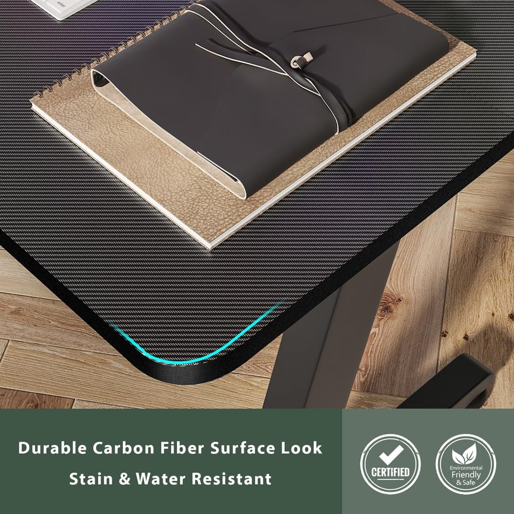 Close-up of the carbon fiber textured desktop surface.