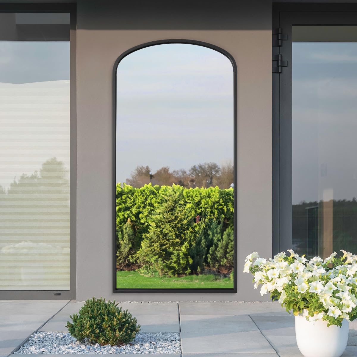 MirrorOutlet The Angustus - Black Metal Framed Modern Shallow Arched Garden Wall and Leaner Mirror 67" X 33" (170CM X 85CM) Black. 2cm Wide Frame and 3cm Deep.…