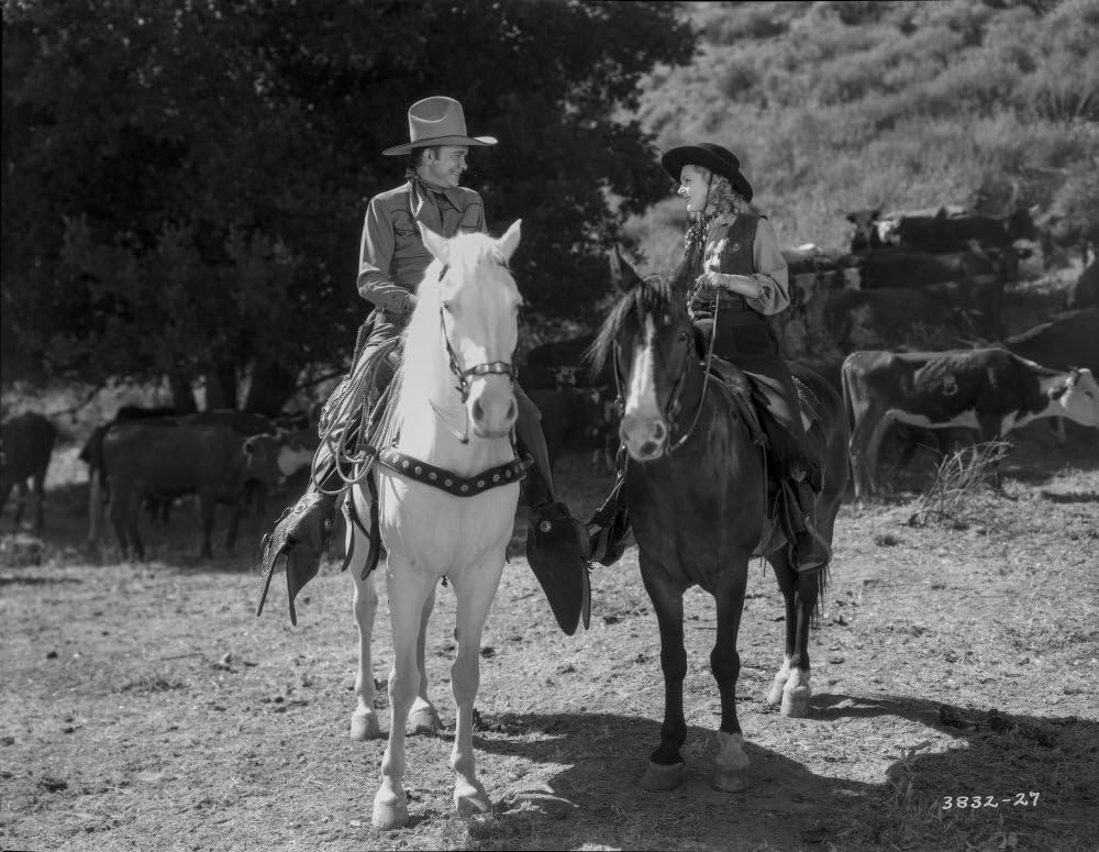 Amazon.com: Tex Ritter and an actress on horseback Photo Print (10 x 8 ...