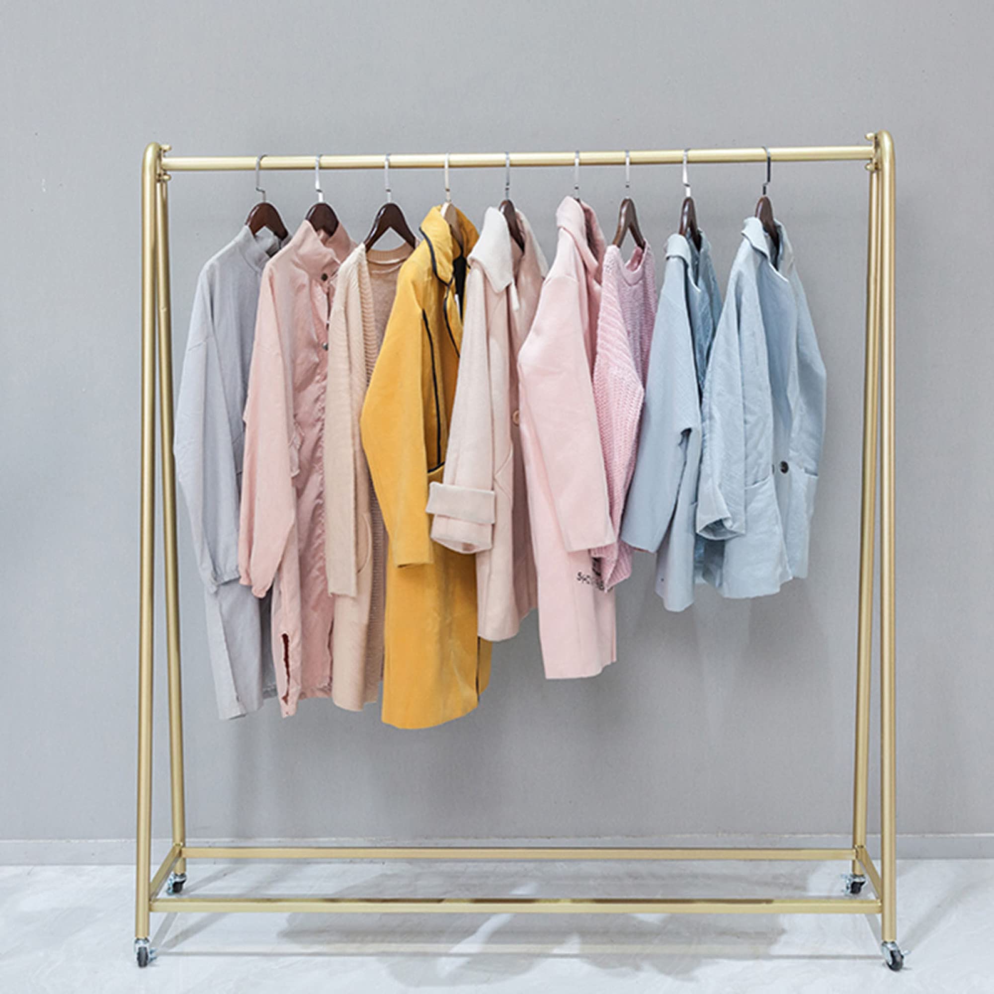 Banco di mostra resistente dell'abbigliamento con gli scaffali del rullo per uso commerciale e della camera da letto