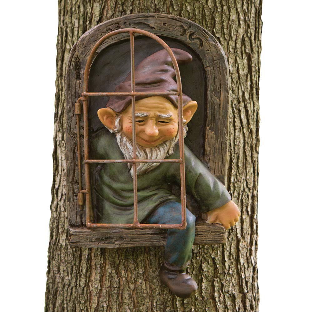 Resin elf face peeking out from a tree trunk | Mubboo