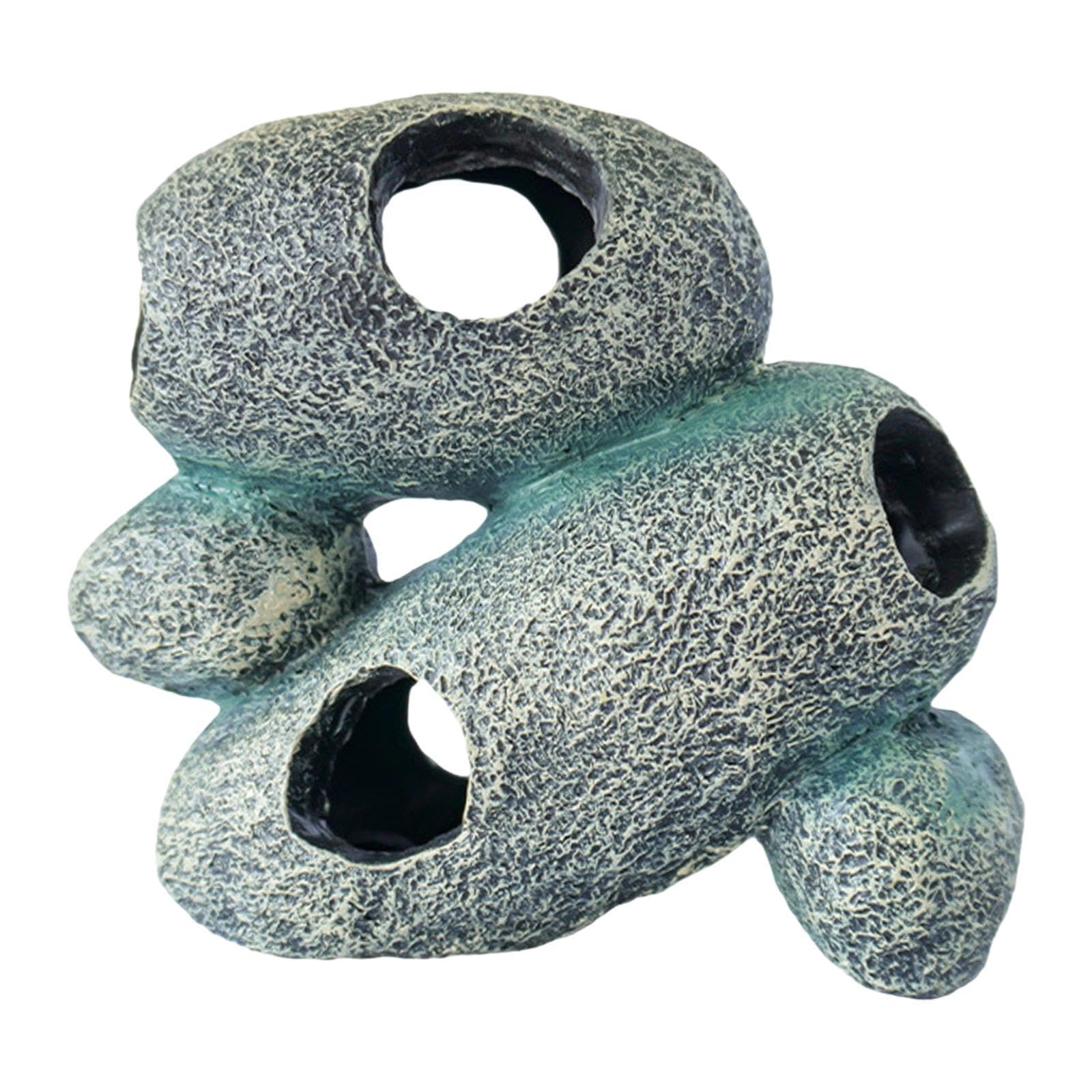 Zona de juegos para acuario doméstico y cueva decorativa para el relax de los peces