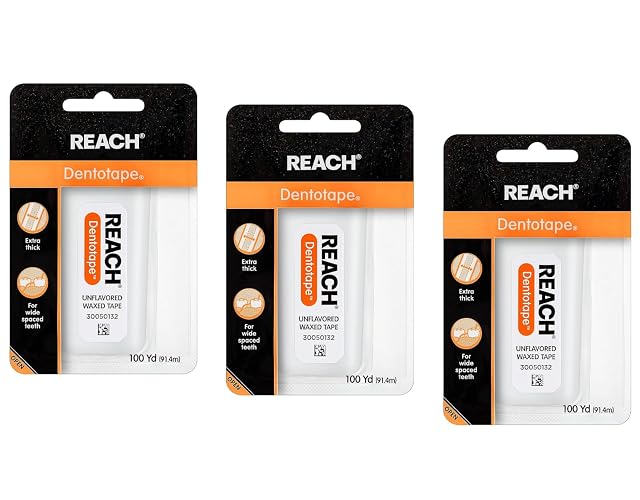 Reach Dentotape Waxed Dental Floss with Extra Wide Cleaning Surface for Large Spaces between Teeth Unflavored 100 Yards