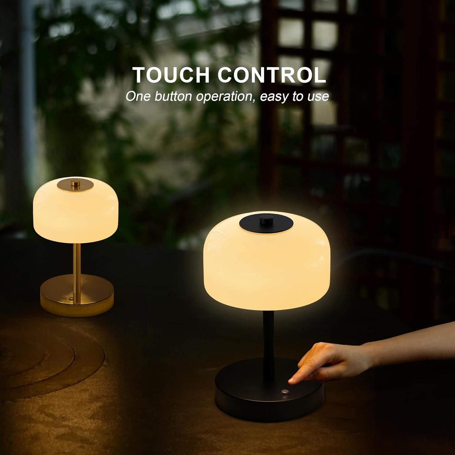 A hand demonstrating the touch control on the base of the Oneach table lamp.
