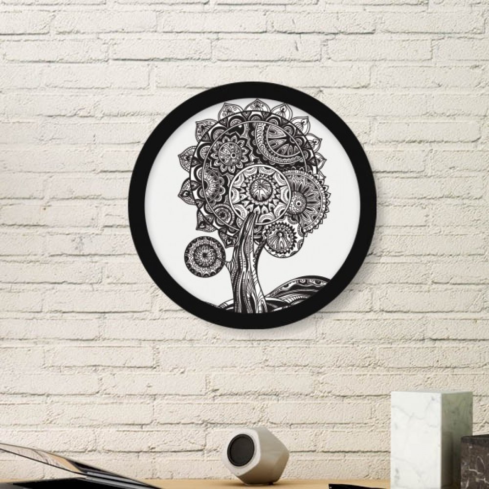 Peinture de tournesol avec cadre rond en bois noir pour raviver un mur blanc vide