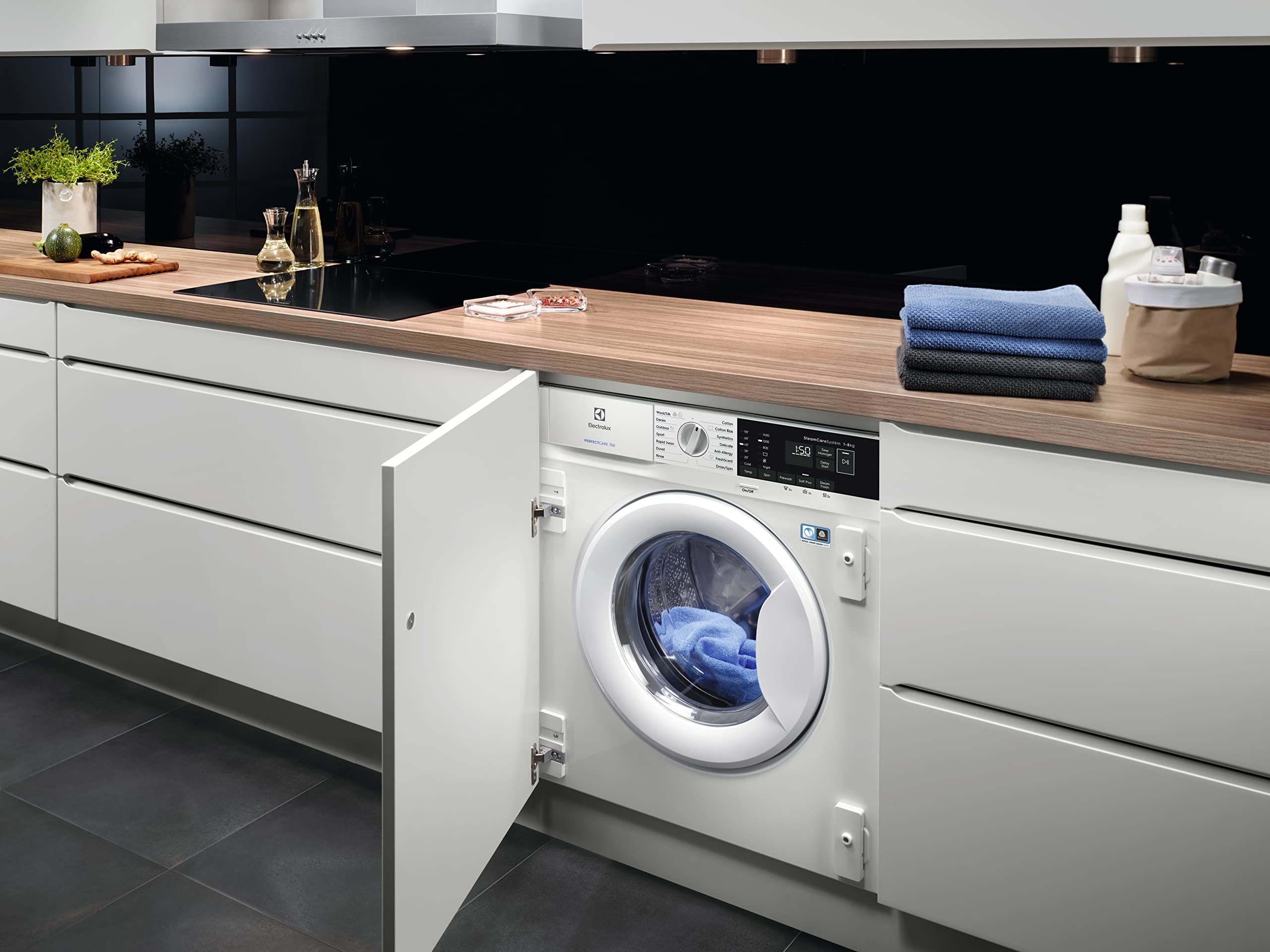 Electrolux EN7F4842OF Lavadora Integrable 8 kg, 1400 rpm, SteamCare con Vapor FreshScent, SensiCare, Time Manager, Display XL LCD, Motor Inverter, Programa Rápido, Certificado Woolmark Blue, Clase B
