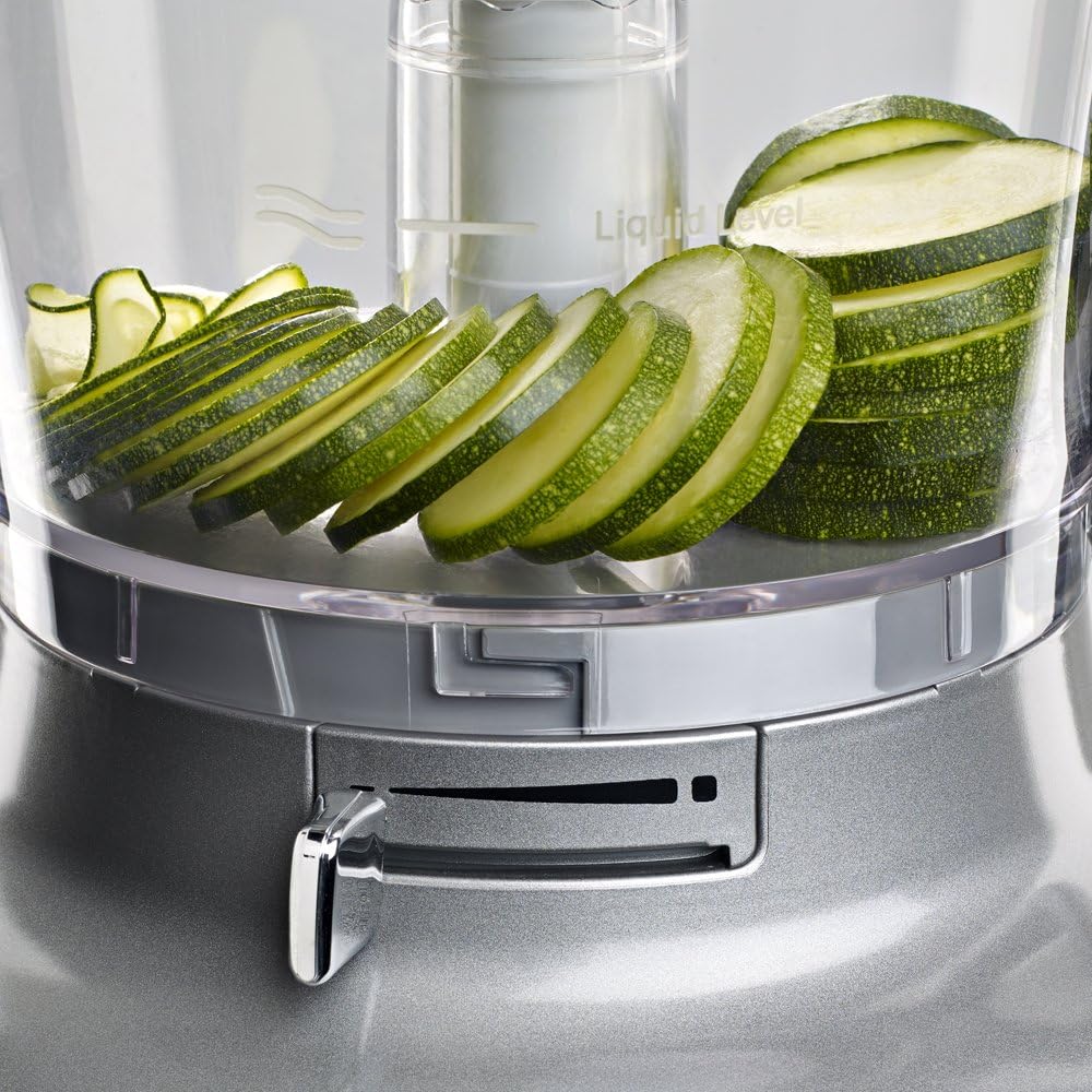 Close-up of the Exact Slice System lever and sliced zucchini