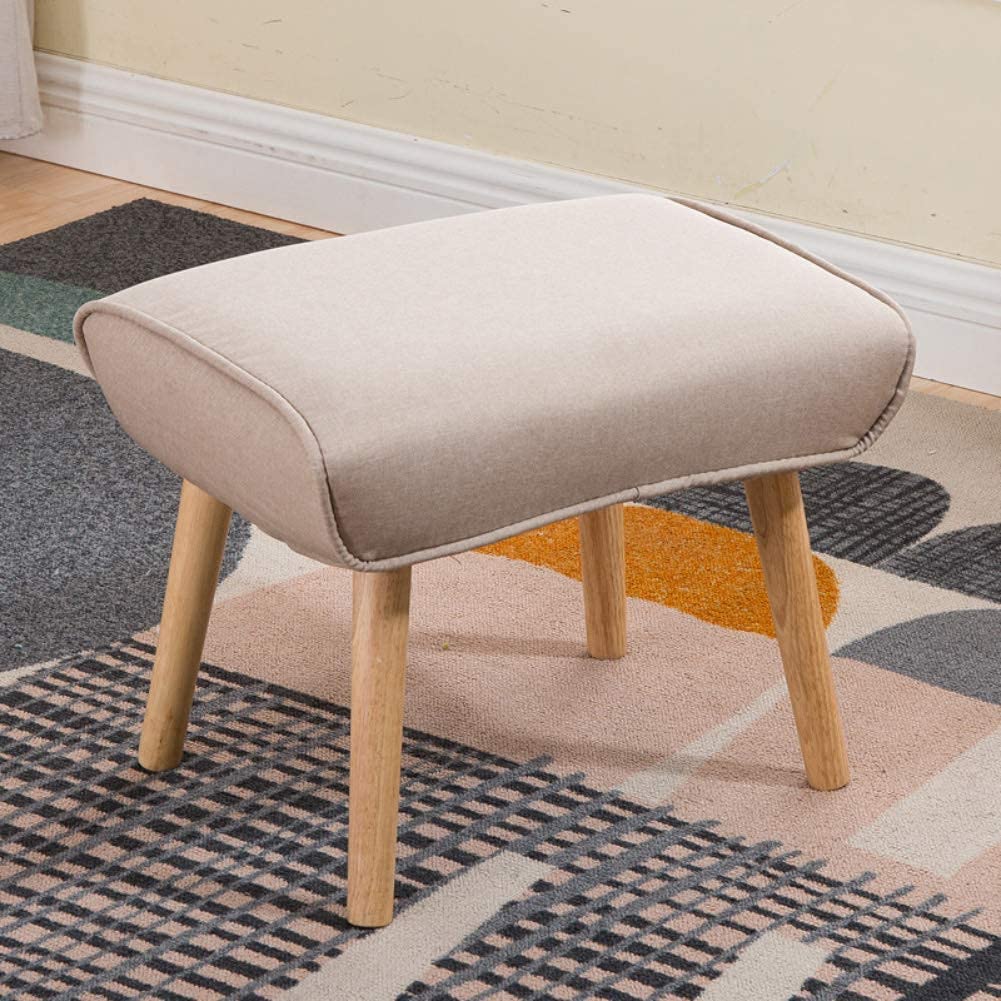 Petit banc marron en bois pour soulager les jambes fatiguées au salon
