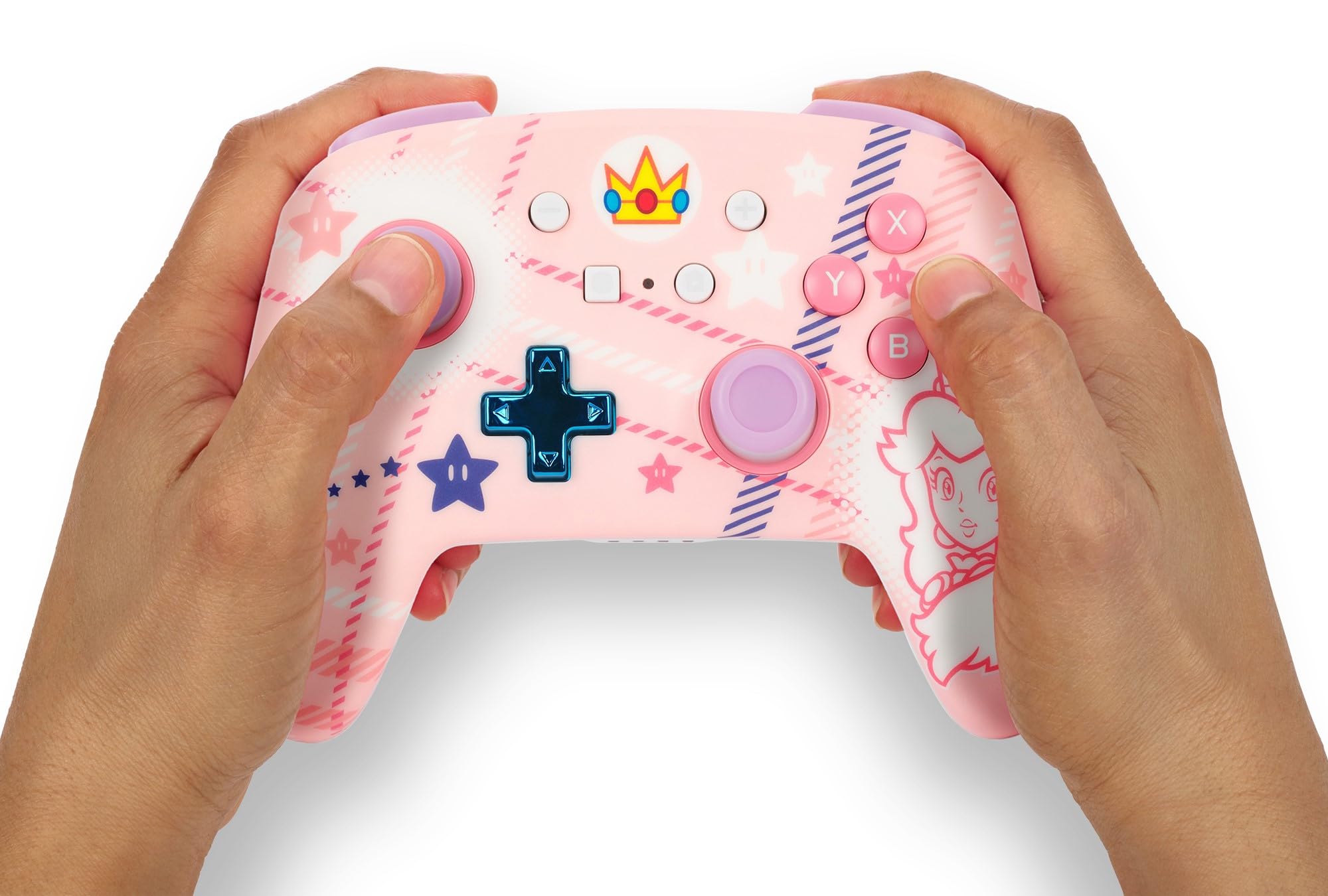 Gros plan sur le design thématique de la manette sans fil PowerA pour Nintendo Switch, inspiré de la Princesse Peach.