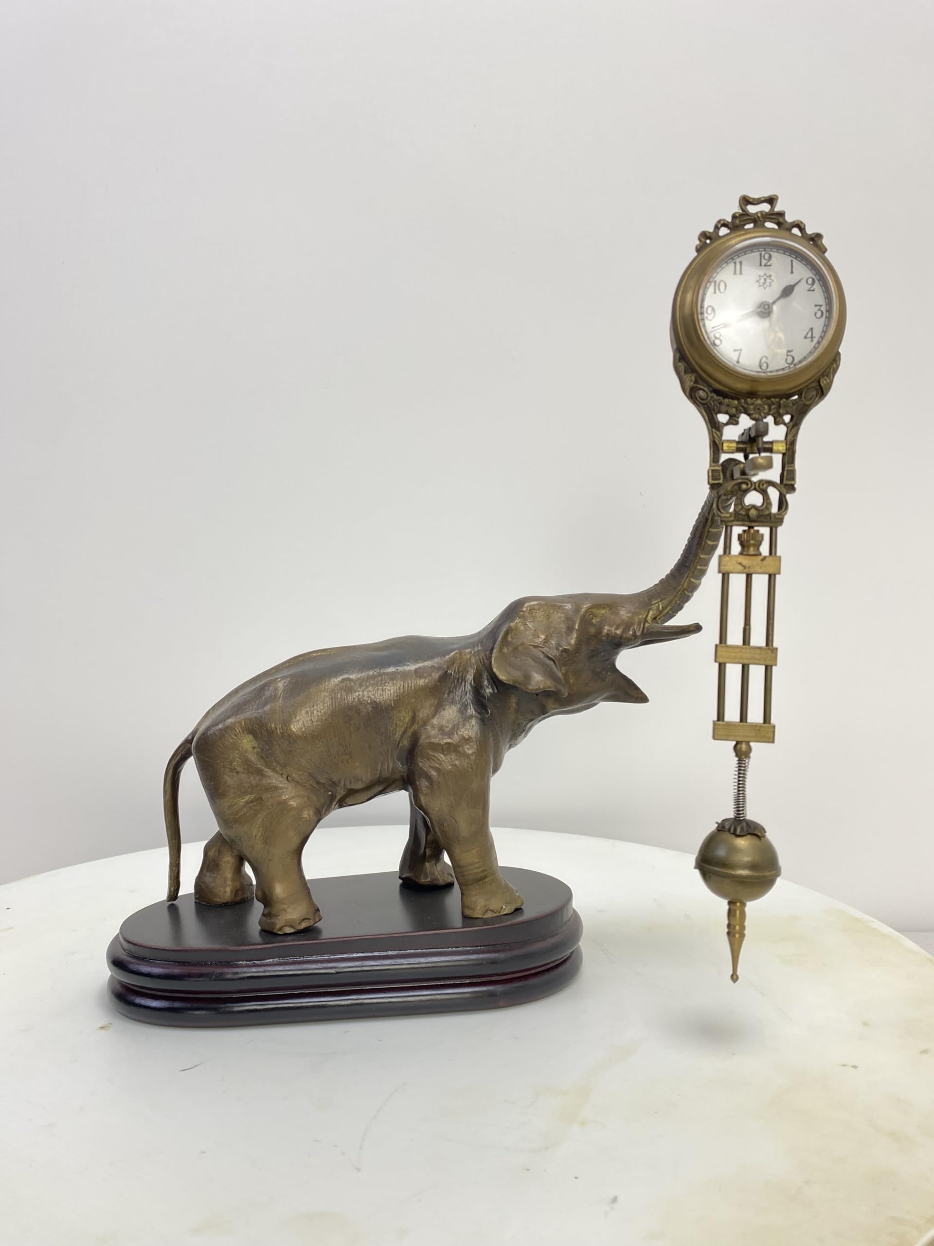 Horloge murale éléphant vintage en bronze pour salon style européen