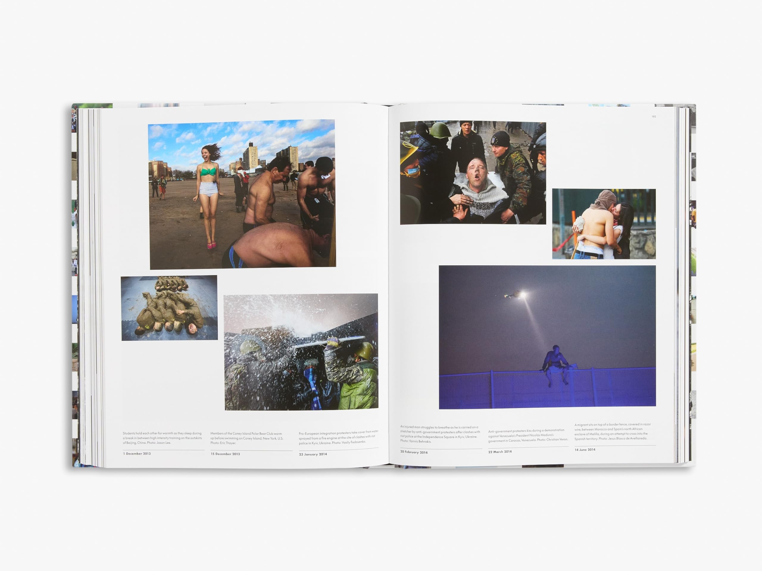 In the Moment : 40 Years of Reuters Photojournalism