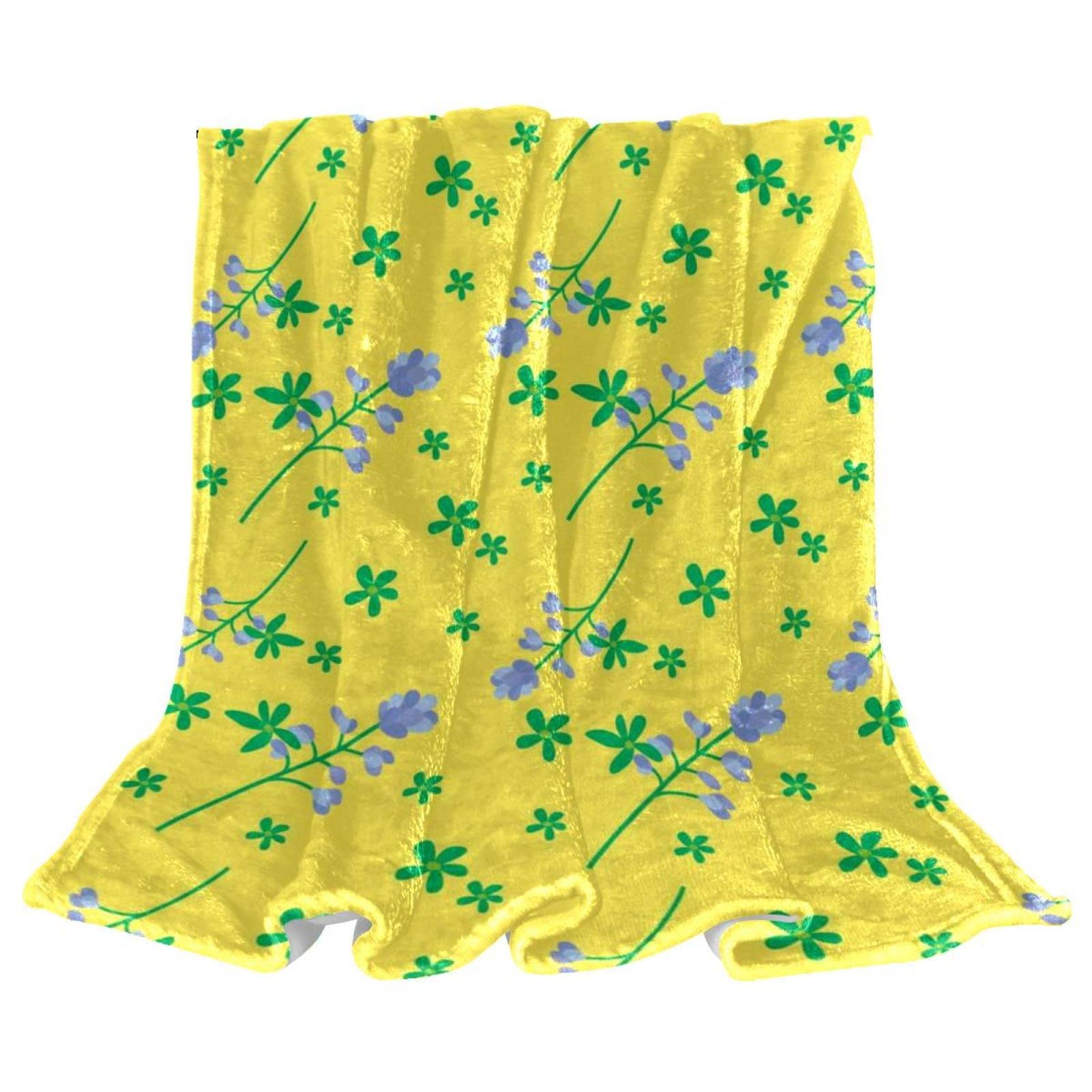 Couverture polaire legere a fleurs pour soiree cocooning sur le canape