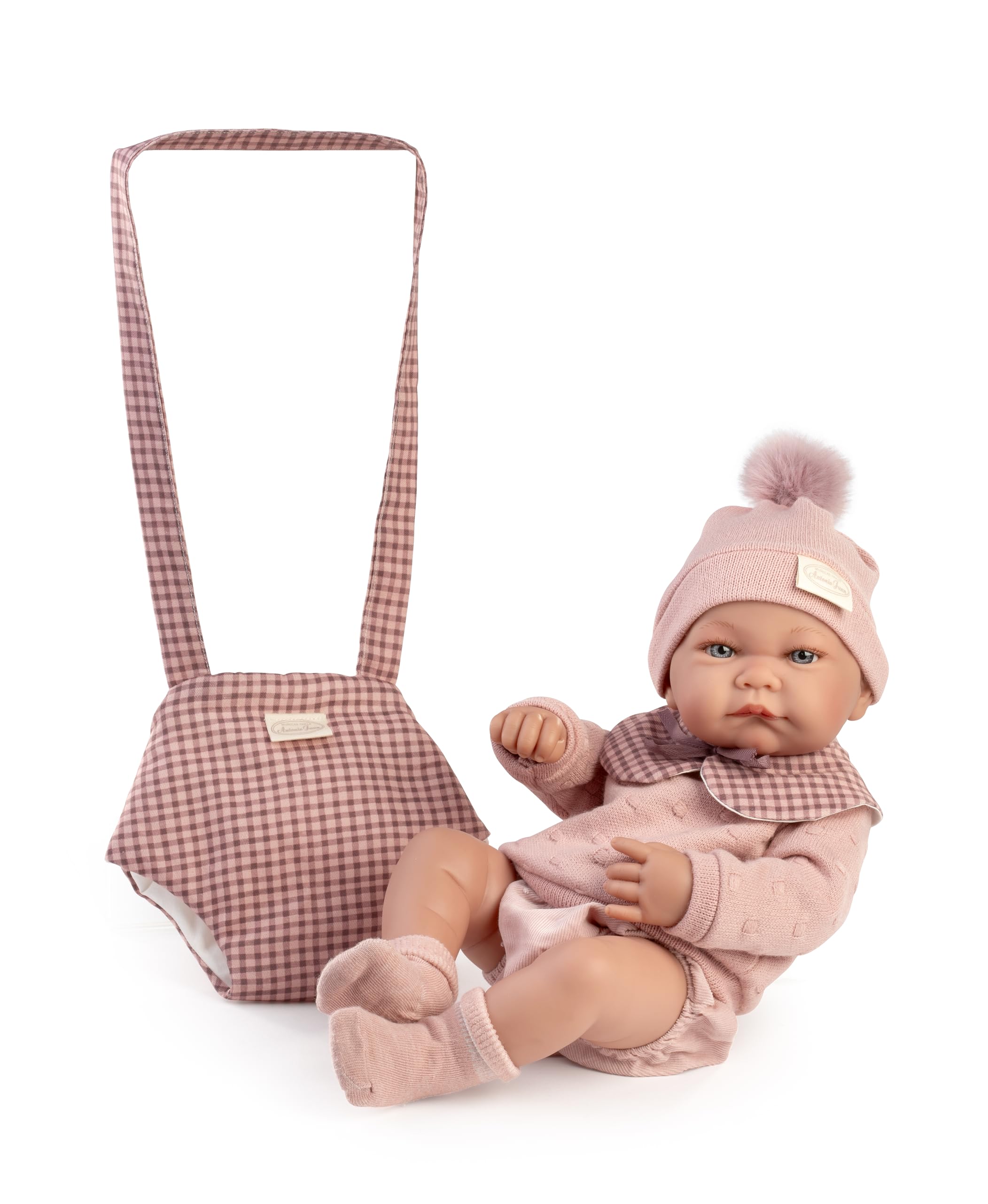 Muñecas Antonio Juan - Recién Nacida nica con Portabebé, Muñeca Bebé Realista con Gorro de Pompón, Outfit a Cuadros Rosa y Accesorios