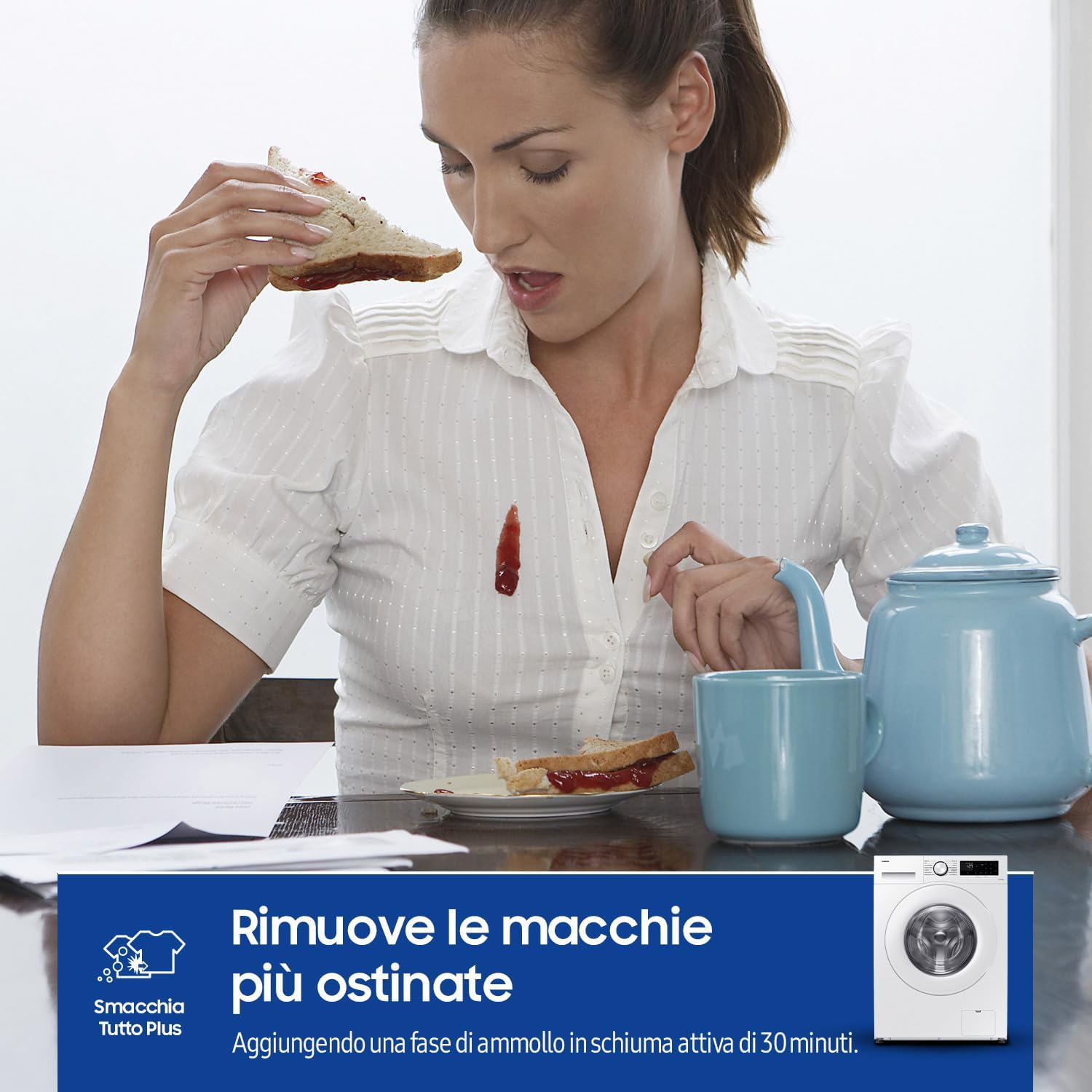 Woman looking at a stain on her shirt, illustrating the need for stain removal.