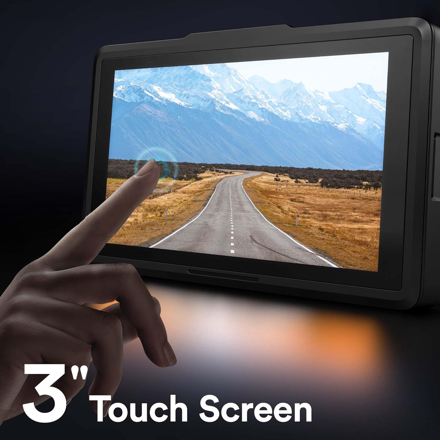 A finger interacting with the 3-inch IPS touch screen of the WOLFANG WD01 Dash Cam, showing a clear road view.