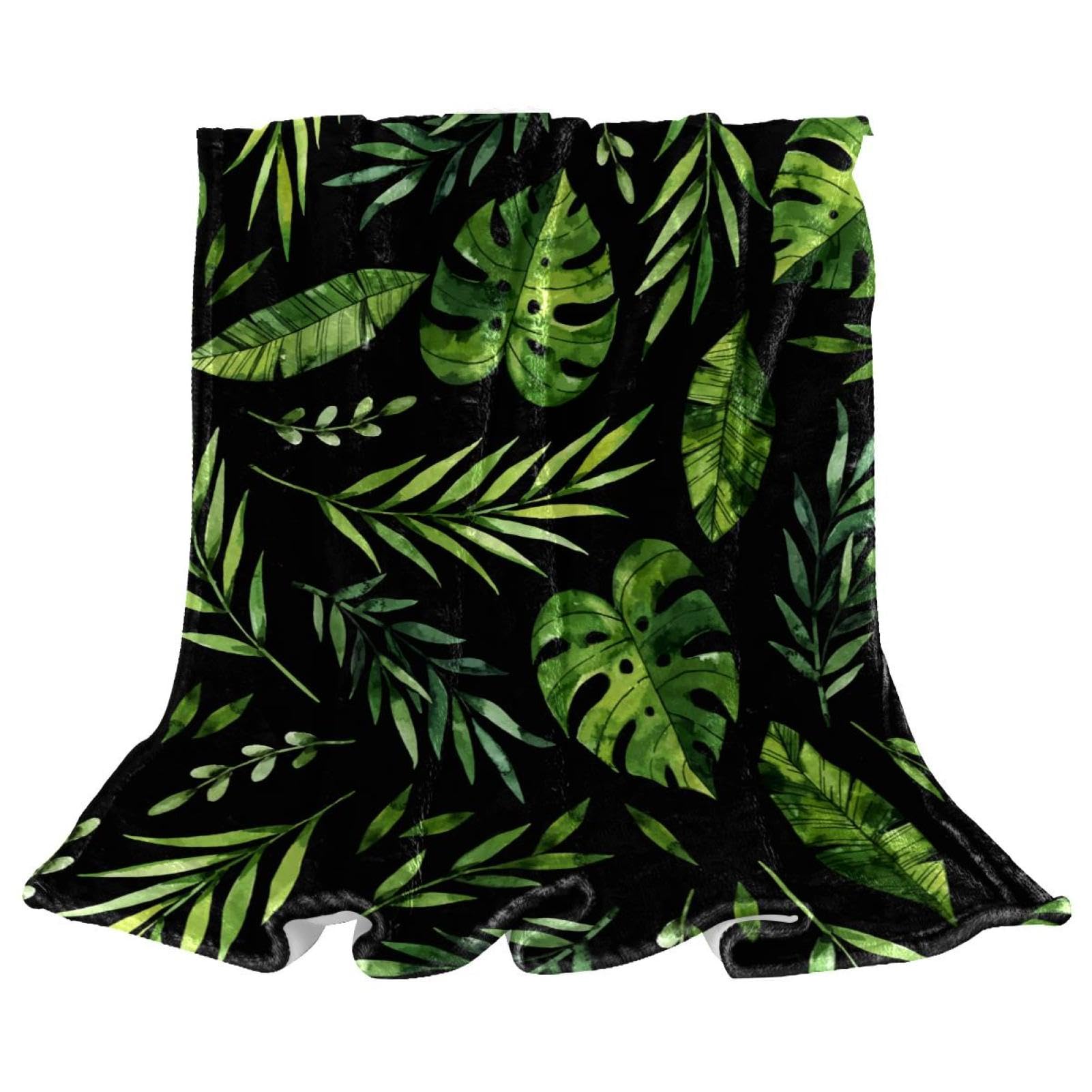 Couverture polaire feuille verte pour réchauffer vos soirées sur le canapé