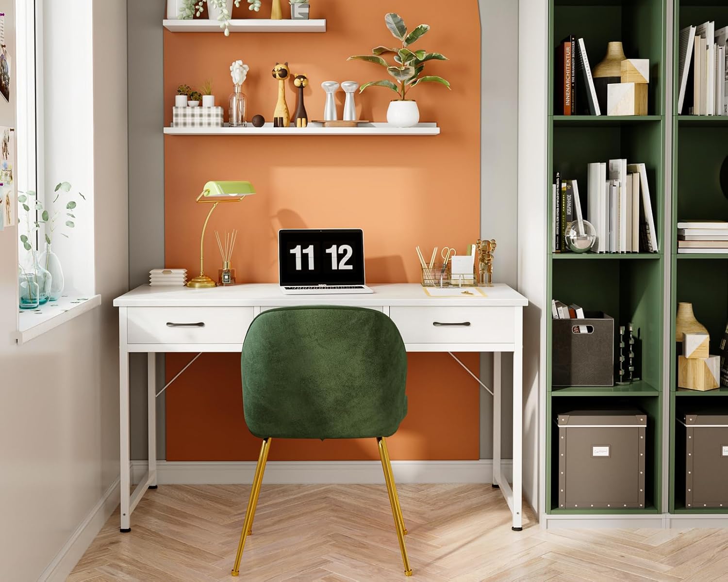 White ODK desk with three drawers in a home office setting, with a laptop, monitor, and office supplies.