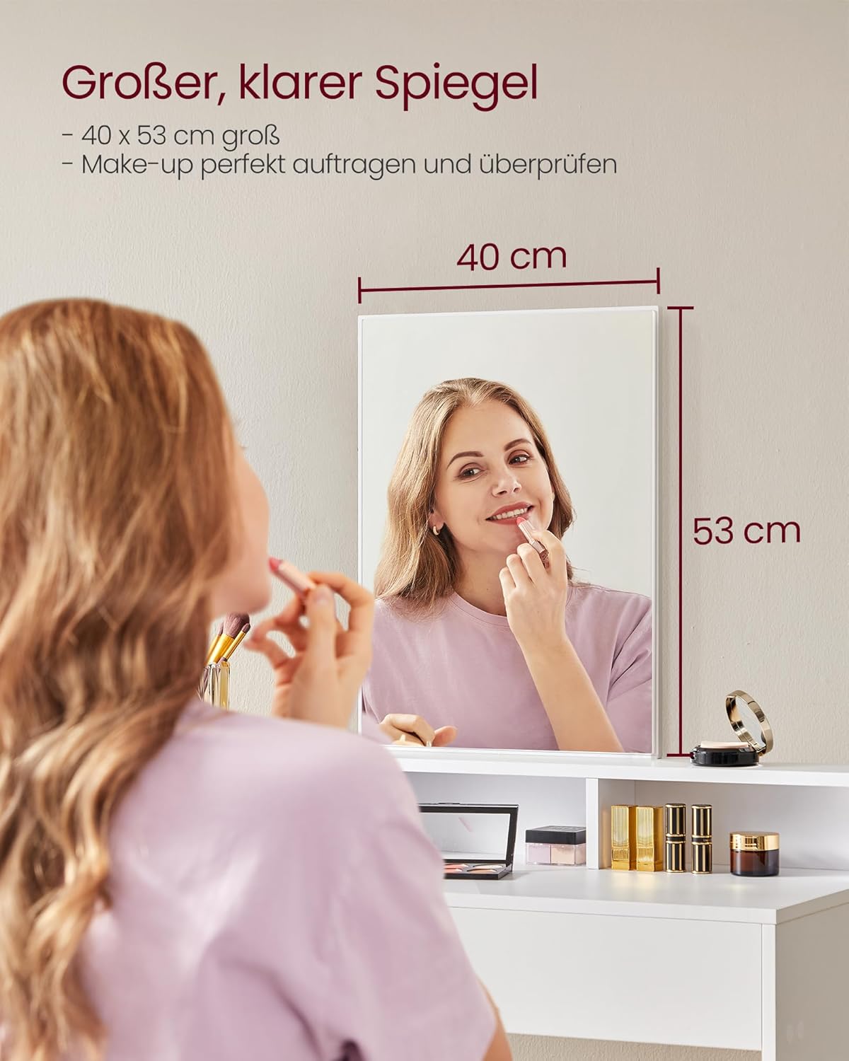 User applying makeup using the large mirror of the VASAGLE Dressing Table