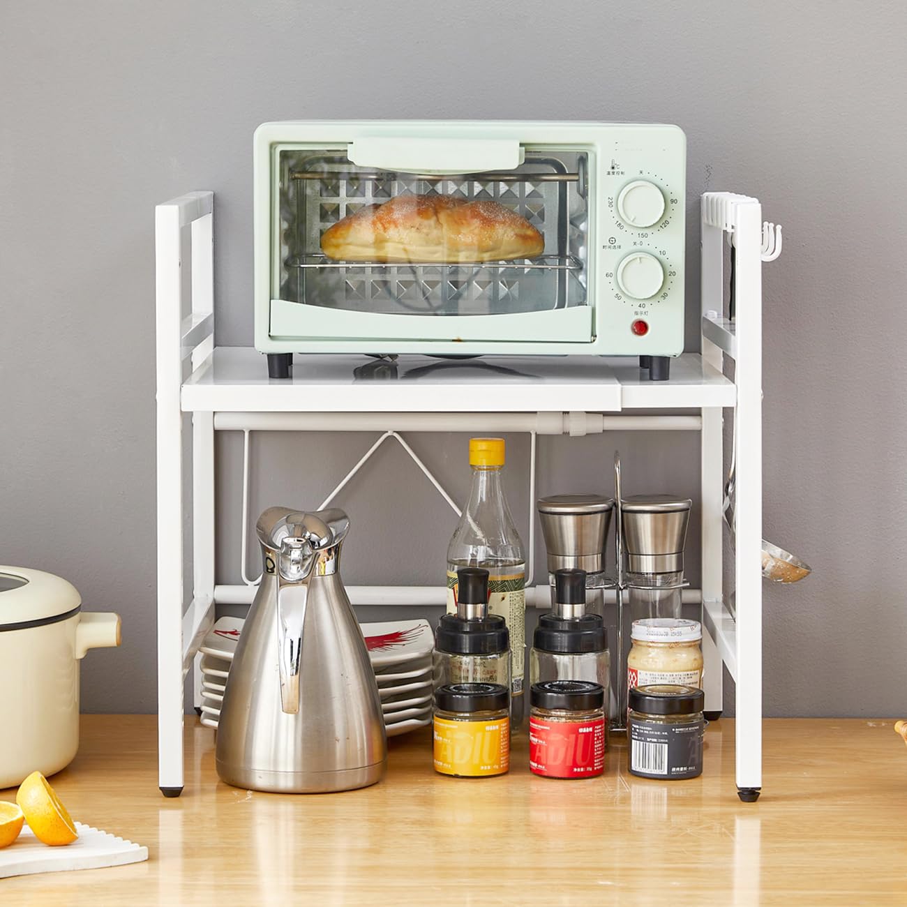 Scaffale allungabile per microonde con 6 ganci, ripiano da bancone per forno a microonde, portaoggetti e organizzazione da cucina, supporto per panettiere per spezie, organizzatore per