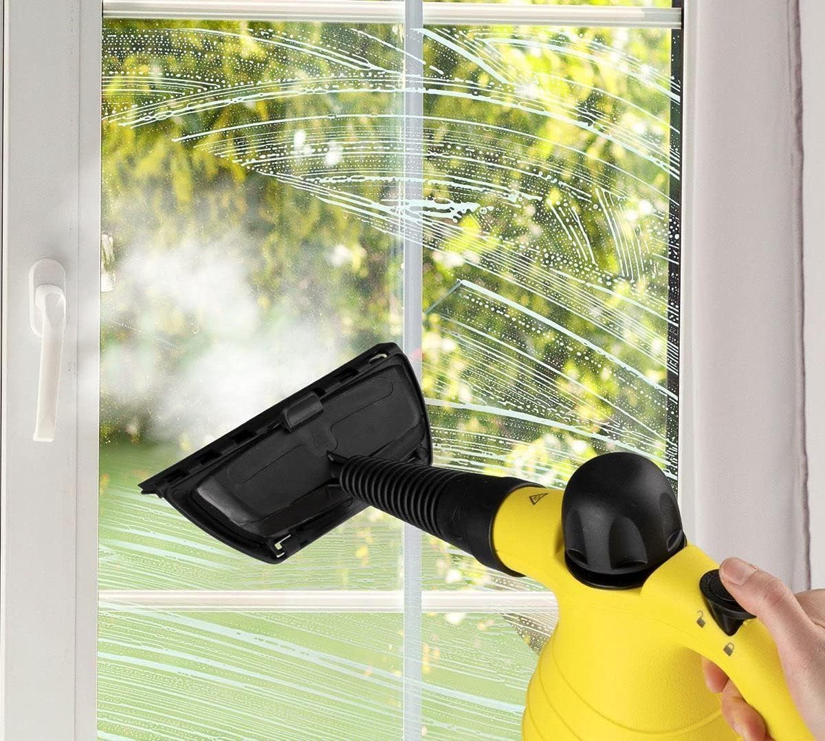 Steam cleaner with window attachment cleaning a window