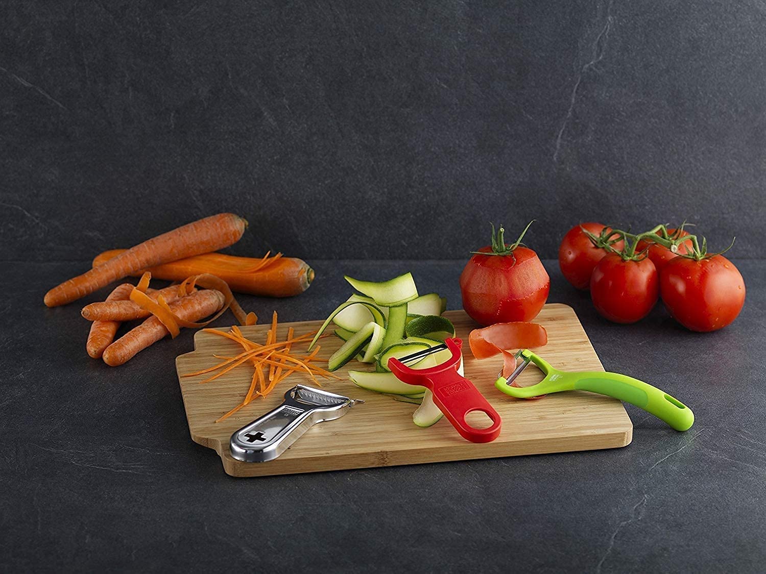 KUHN RIKON 24286 Swiss Peeler zestaw 2-częściowy, obieraczka do warzyw, ostrze ze stali nierdzewnej, czerwony i zielony, plastikowy