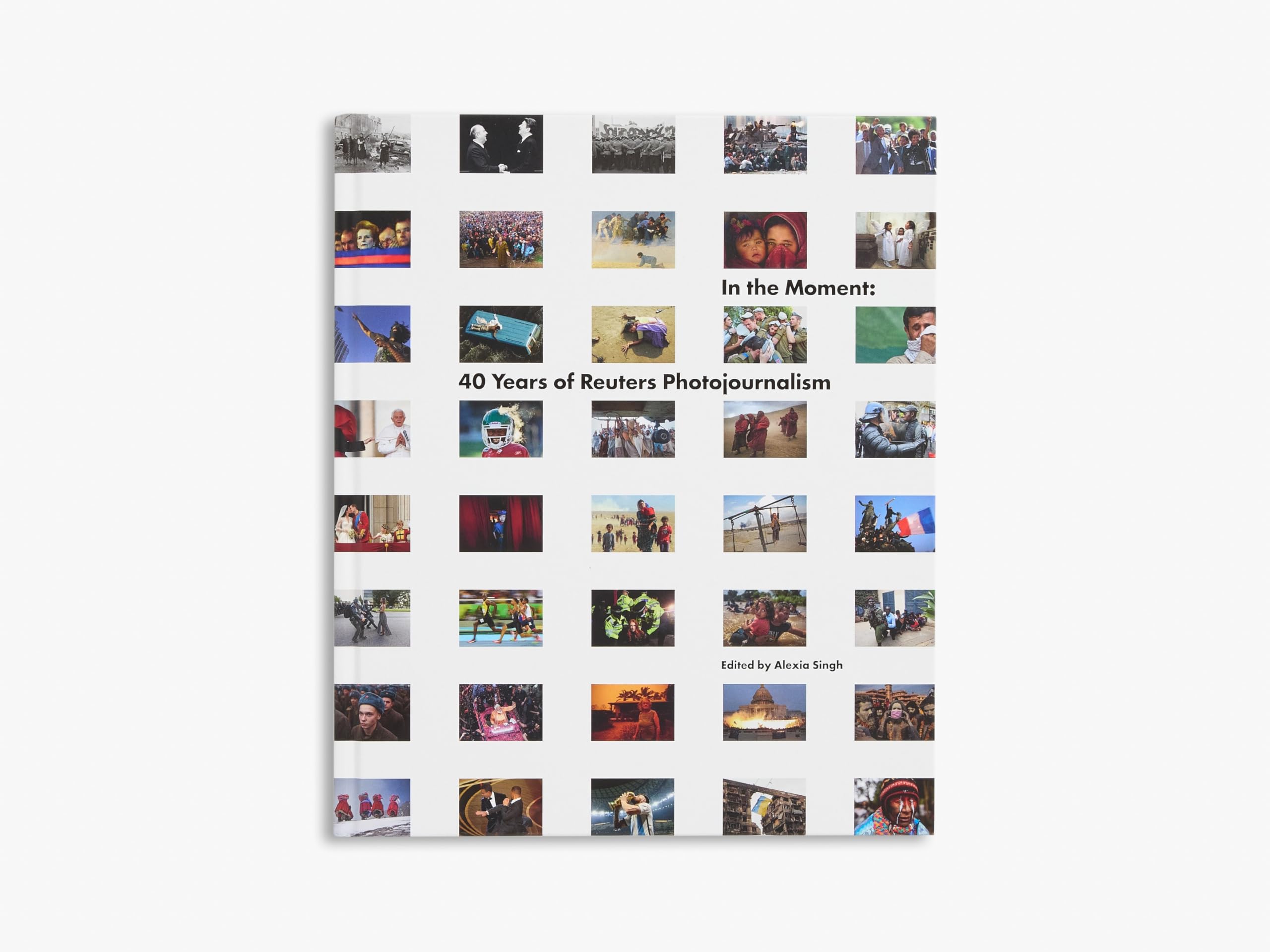 In the Moment : 40 Years of Reuters Photojournalism