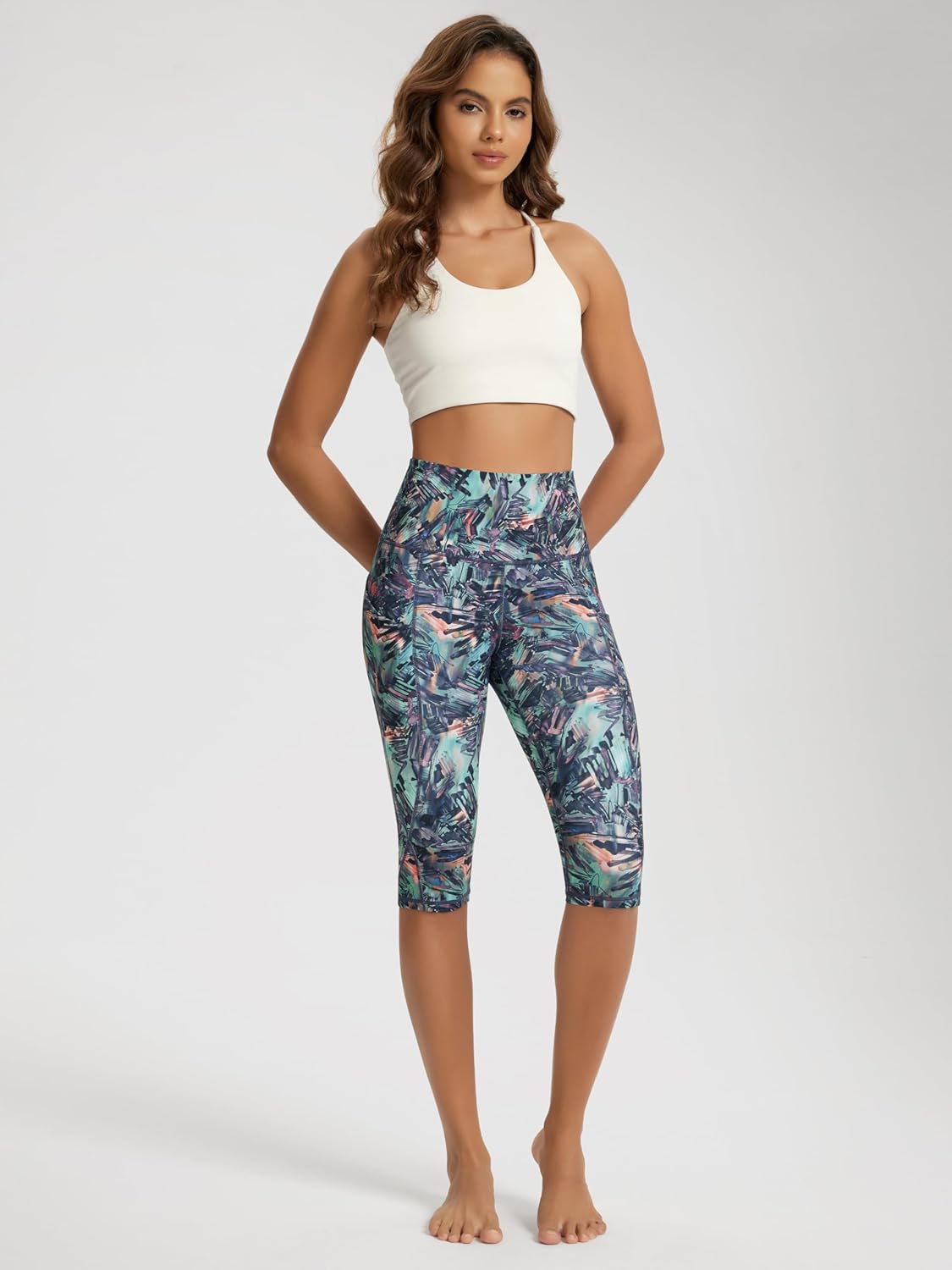 ODODOS Women's High Waisted Yoga Capris with Pockets, Tummy Control Non See Through Workout Athletic Running Capri Leggings - Image 3