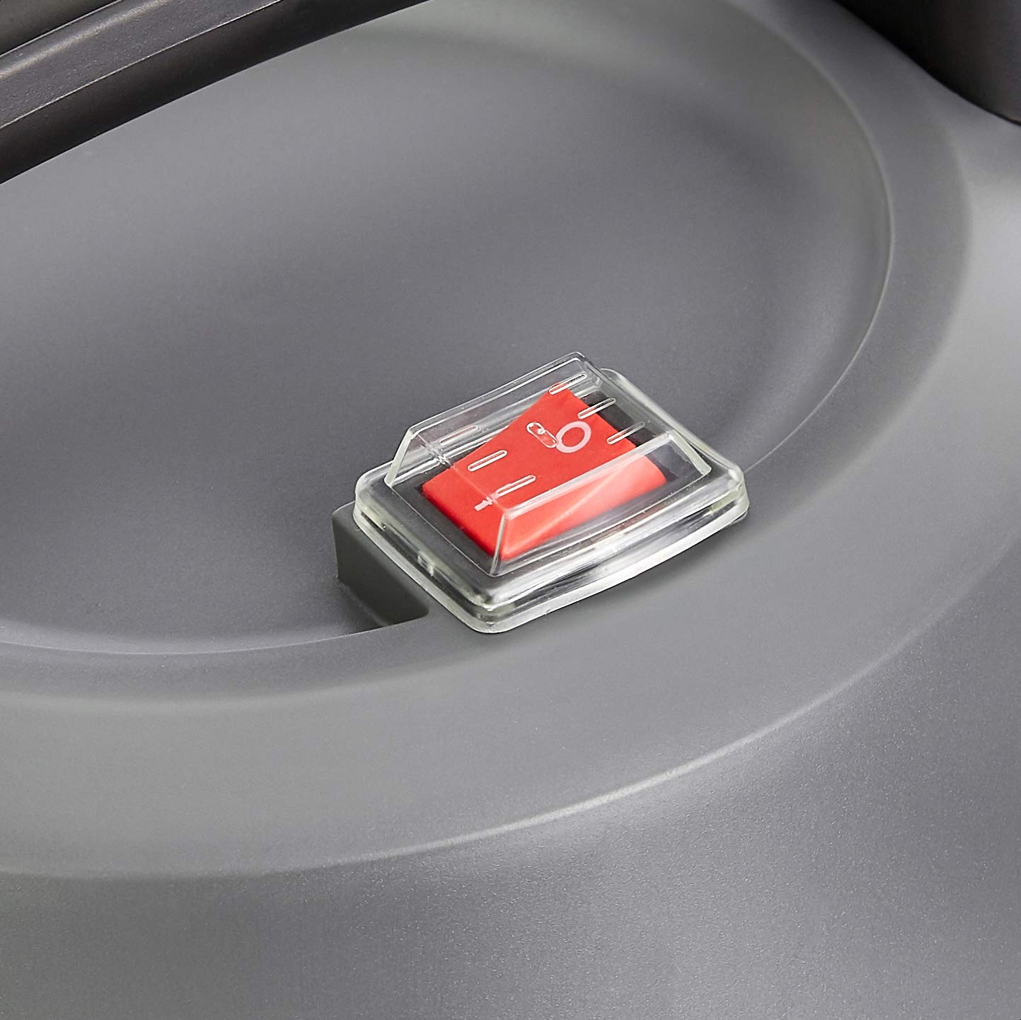Close-up of the power switch on the vacuum cleaner