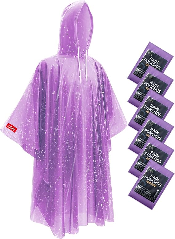 An open purple poncho next to six pouches of purple ponchos