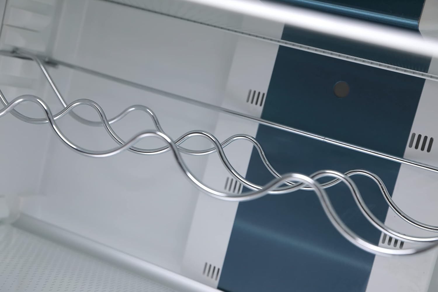 Close-up of wine rack inside the refrigerator