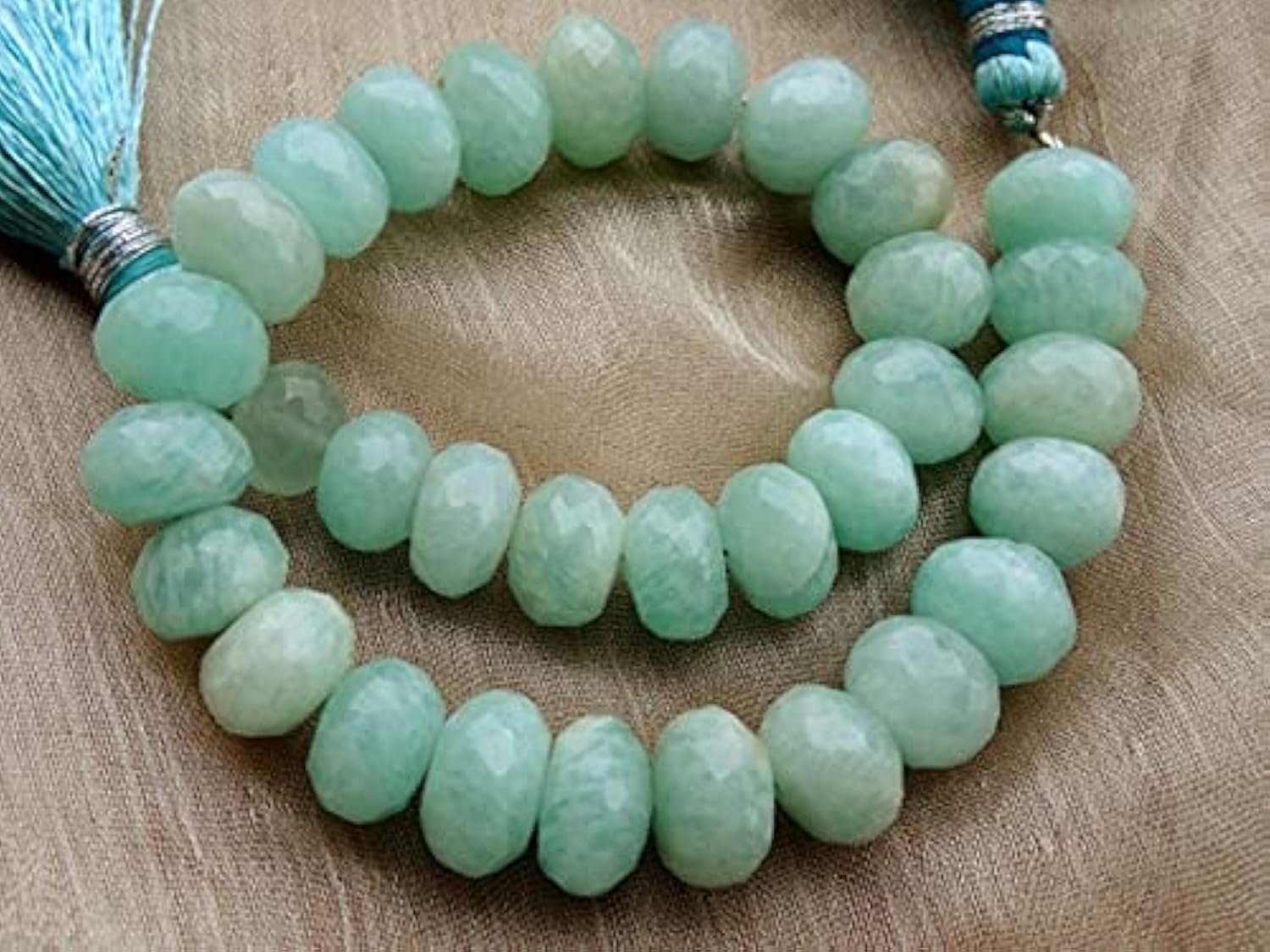 Aquamarine faceted rondelle : finissez vos colliers de perles naturelles sans défaut