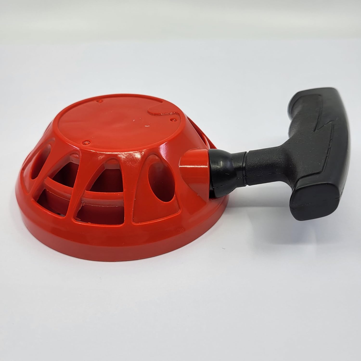 Sterwins PHT1-60.2 Starter Assembly, side view of the red housing with a black pull handle.