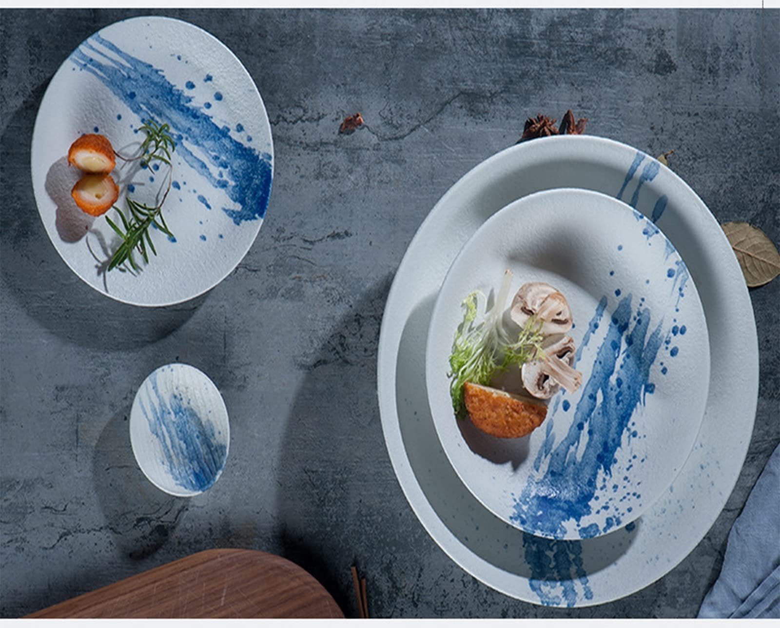 SAeWare Set di stoviglie in ceramica, set di piatti e ciotole per ristorante, 36 pezzi, set combinato di stoviglie con inchiostro blu spruzzato, forma irregolare opaca