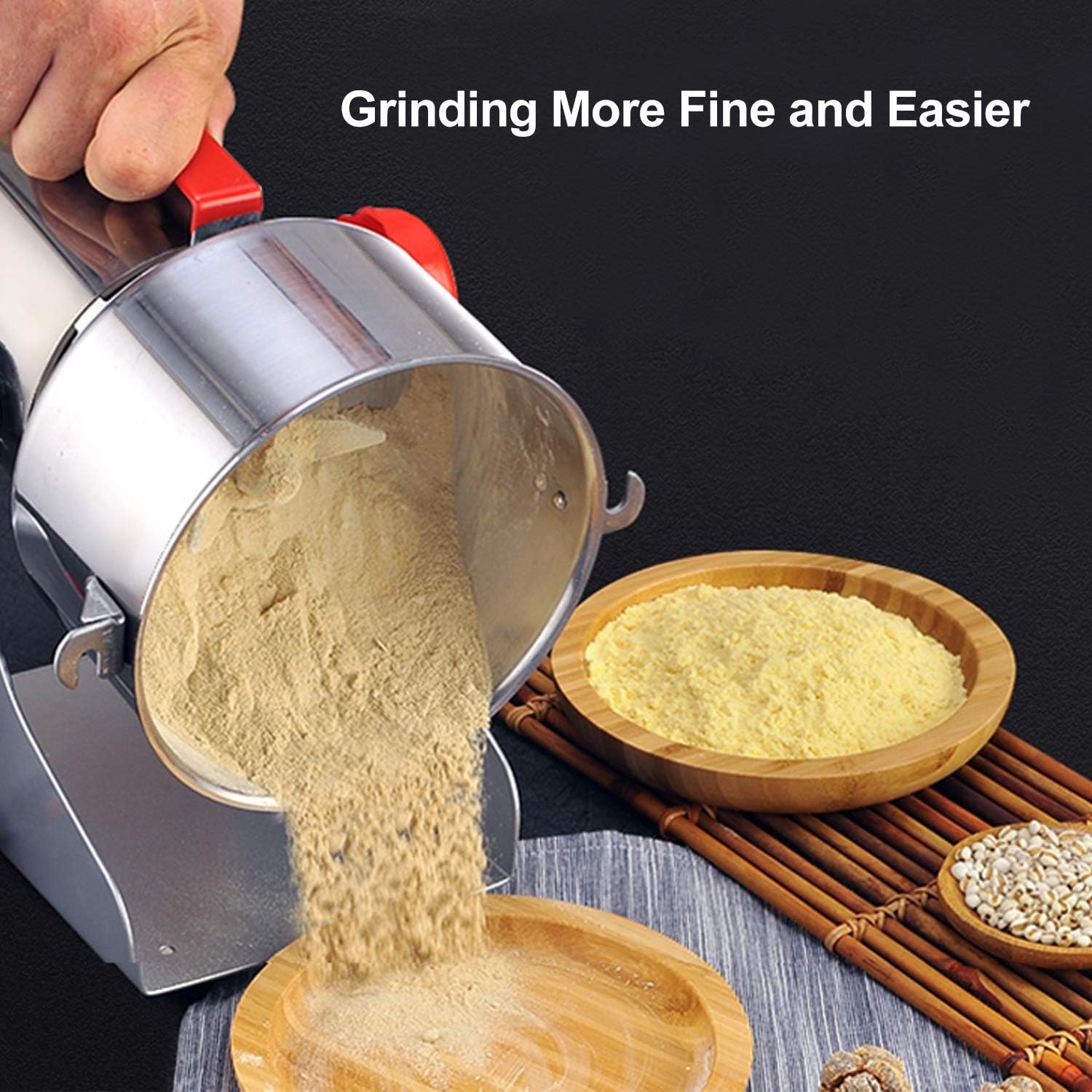 Ground powder being poured from the BioloMix 700G Grinder into a bowl.