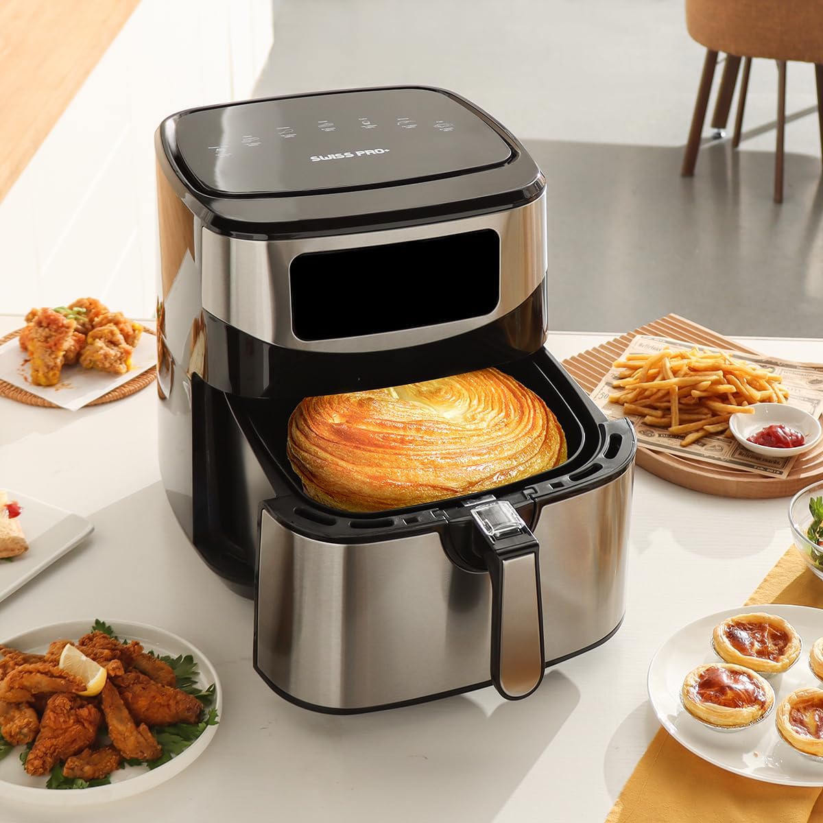 Swiss Pro+ Air Fryer XXL cooking a large pastry or bread