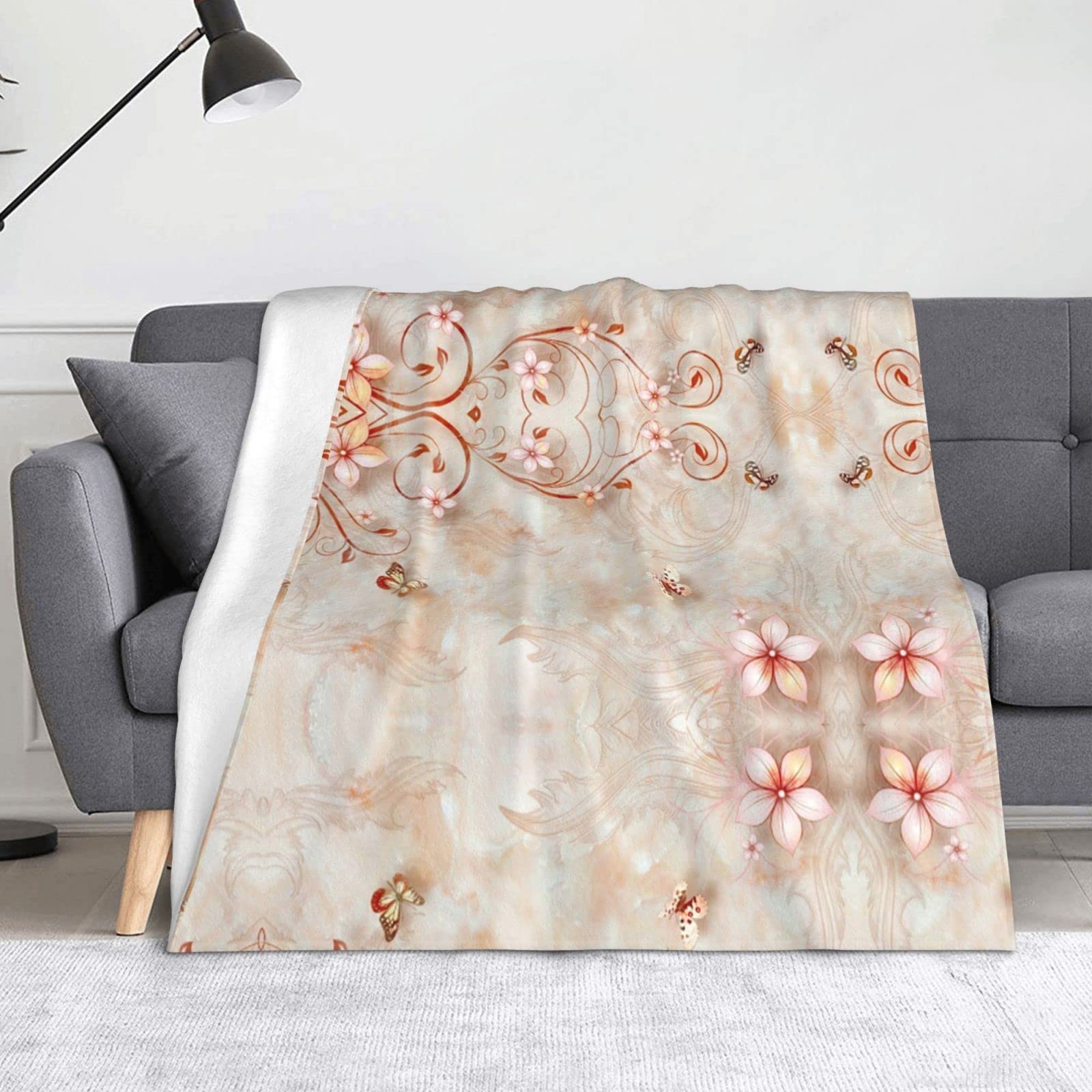Couverture polaire douce à fleurs pour vos soirées cocooning de salon