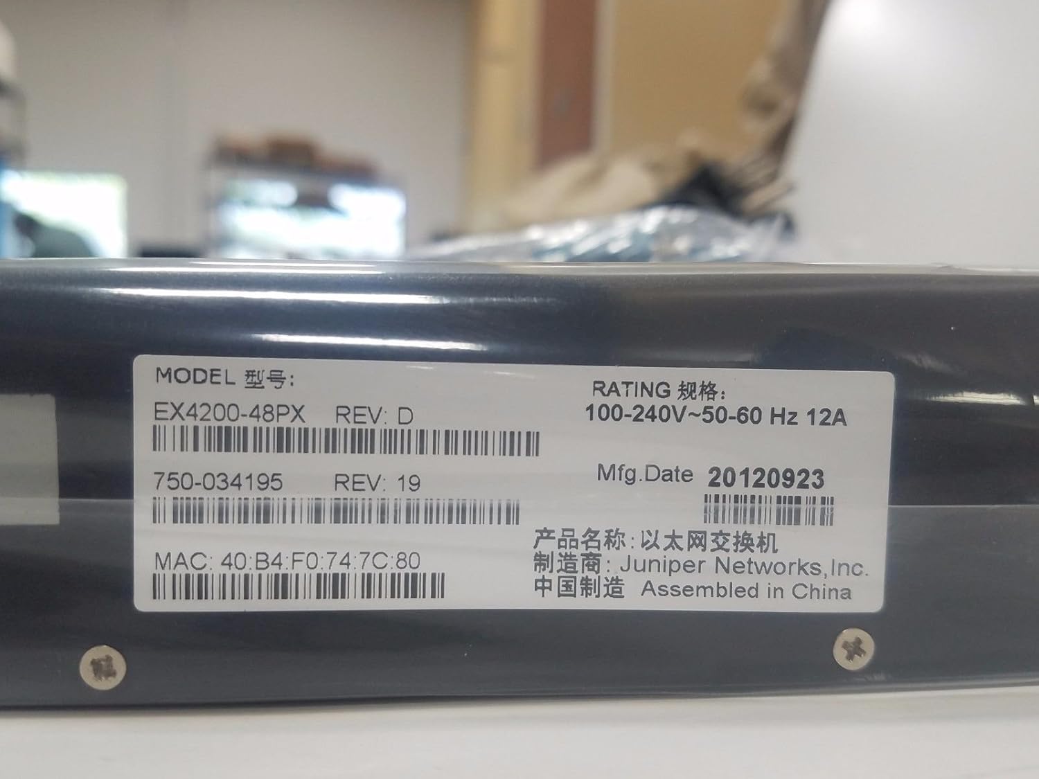 Product label of Juniper EX4200-48PX showing model, MAC address, and manufacturing date