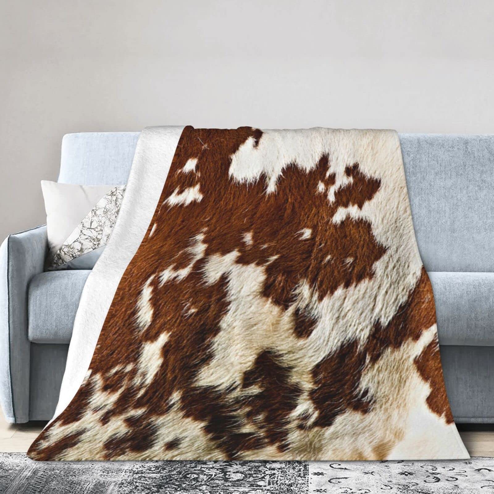 Couverture polaire microfibres haut de gamme motif vache rouge pour canapé chic